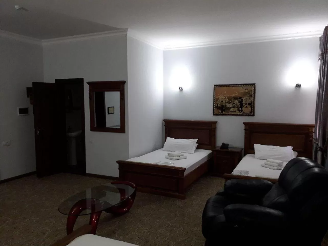 Bed in Maximum Hotel