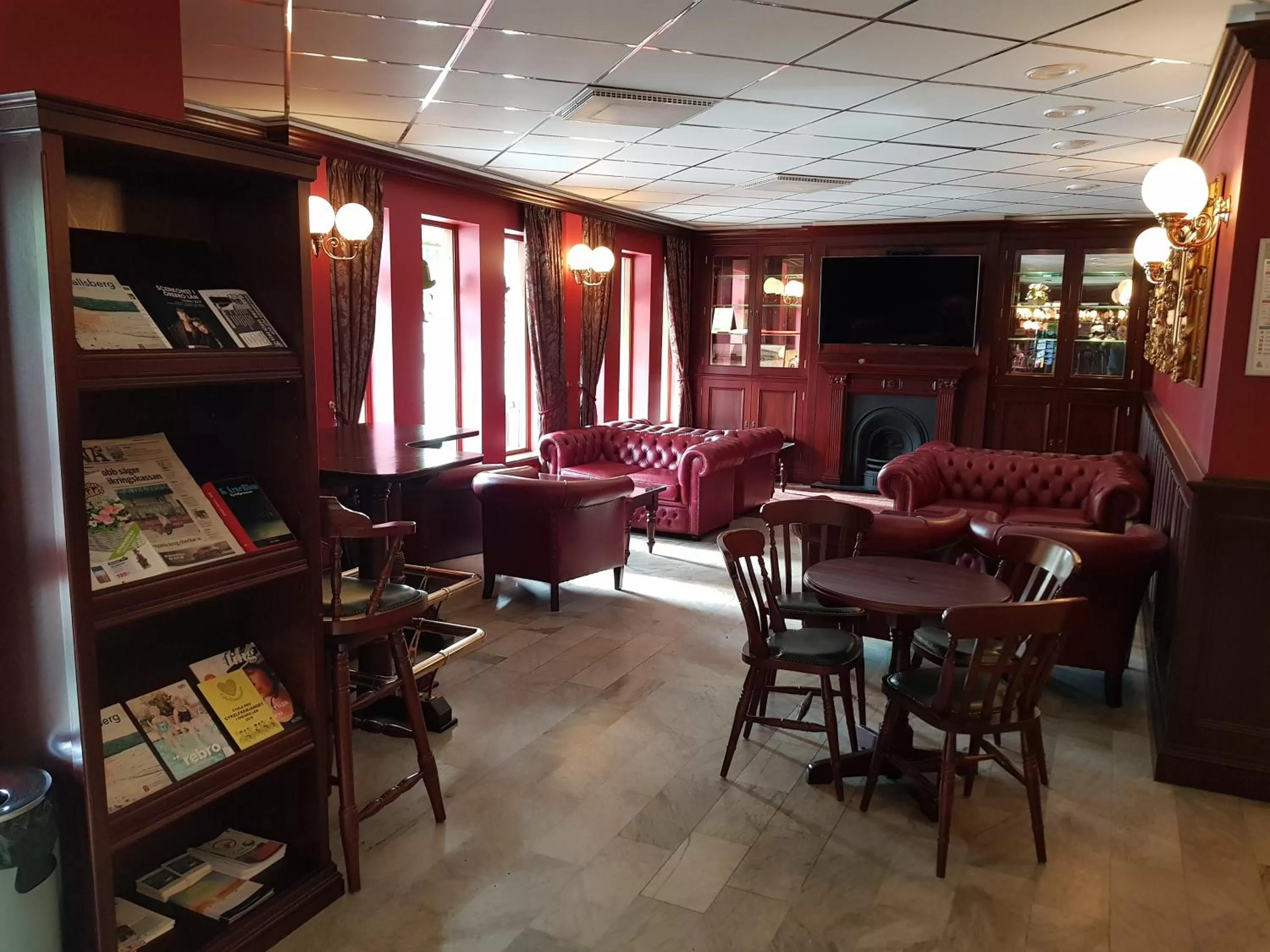 Communal lounge/ TV room in Hotell Stinsen