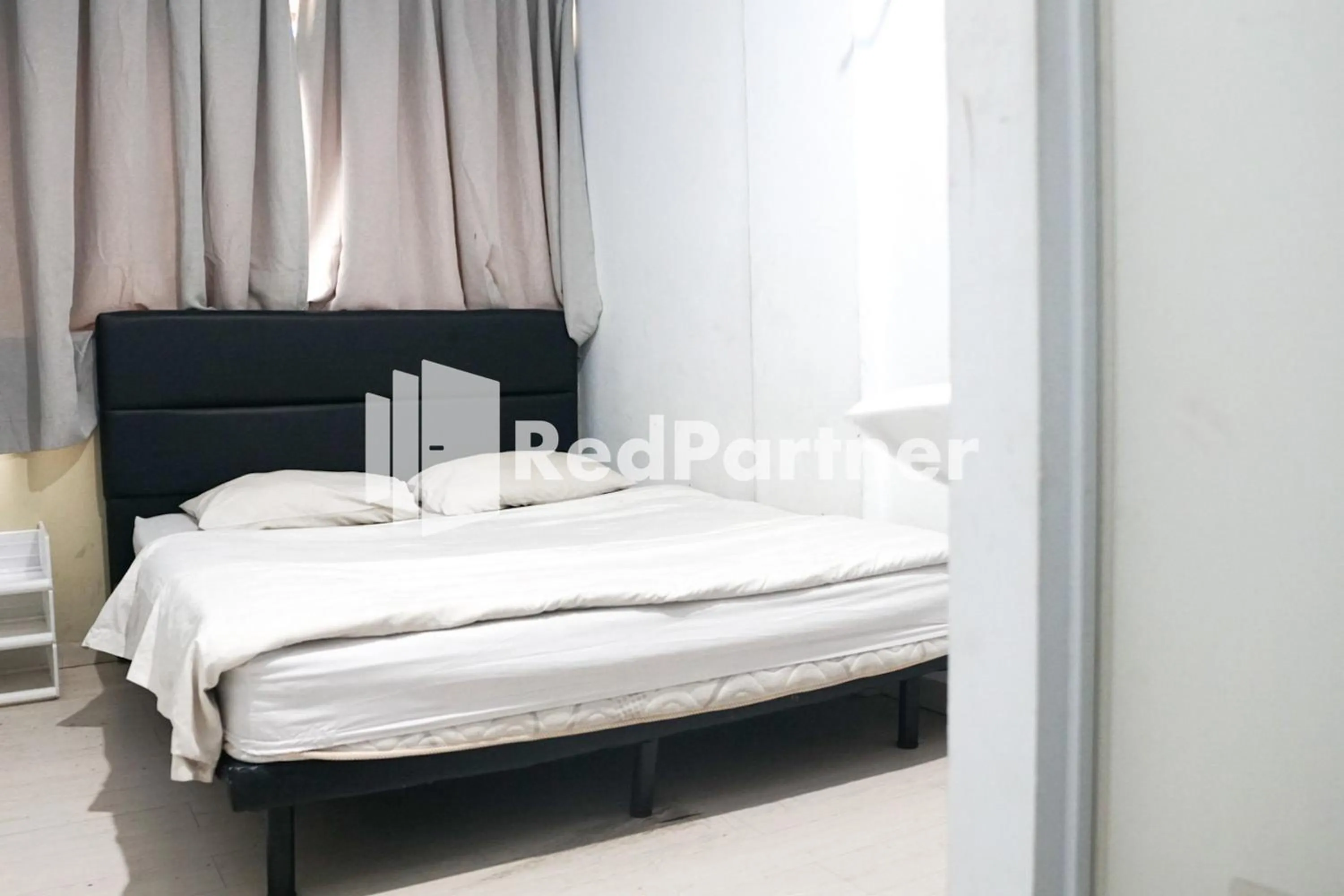 Bedroom in Cosmo Harmoni RedPartner