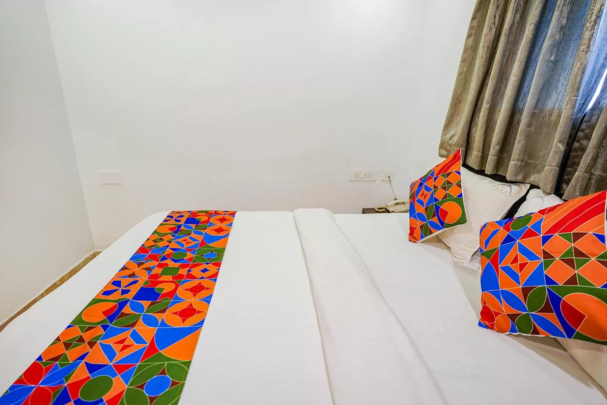 Bed in FabHotel Earth