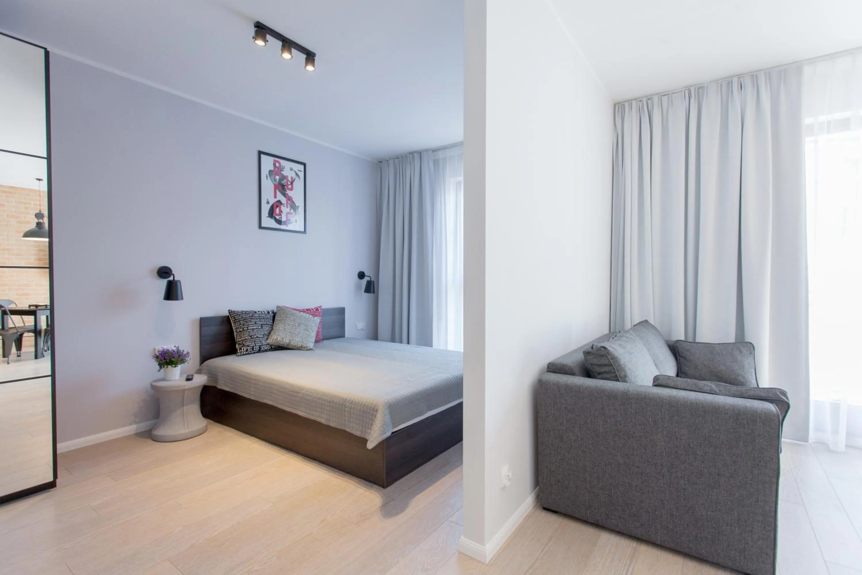 Living room, Bed in GRANO APARTMENTS Gdańsk Motława SPA & Wellness