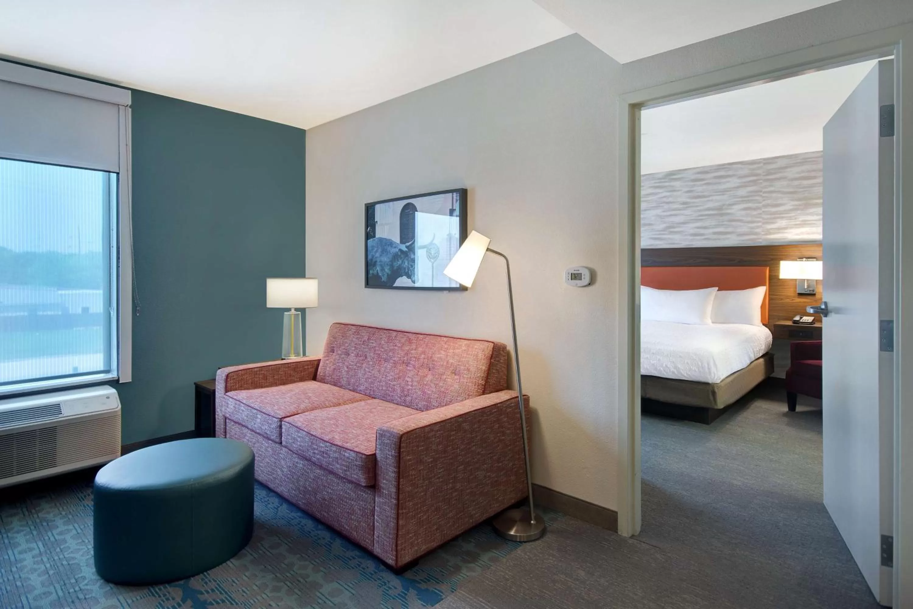 Living room, Bed in Home2 Suites By Hilton Waco