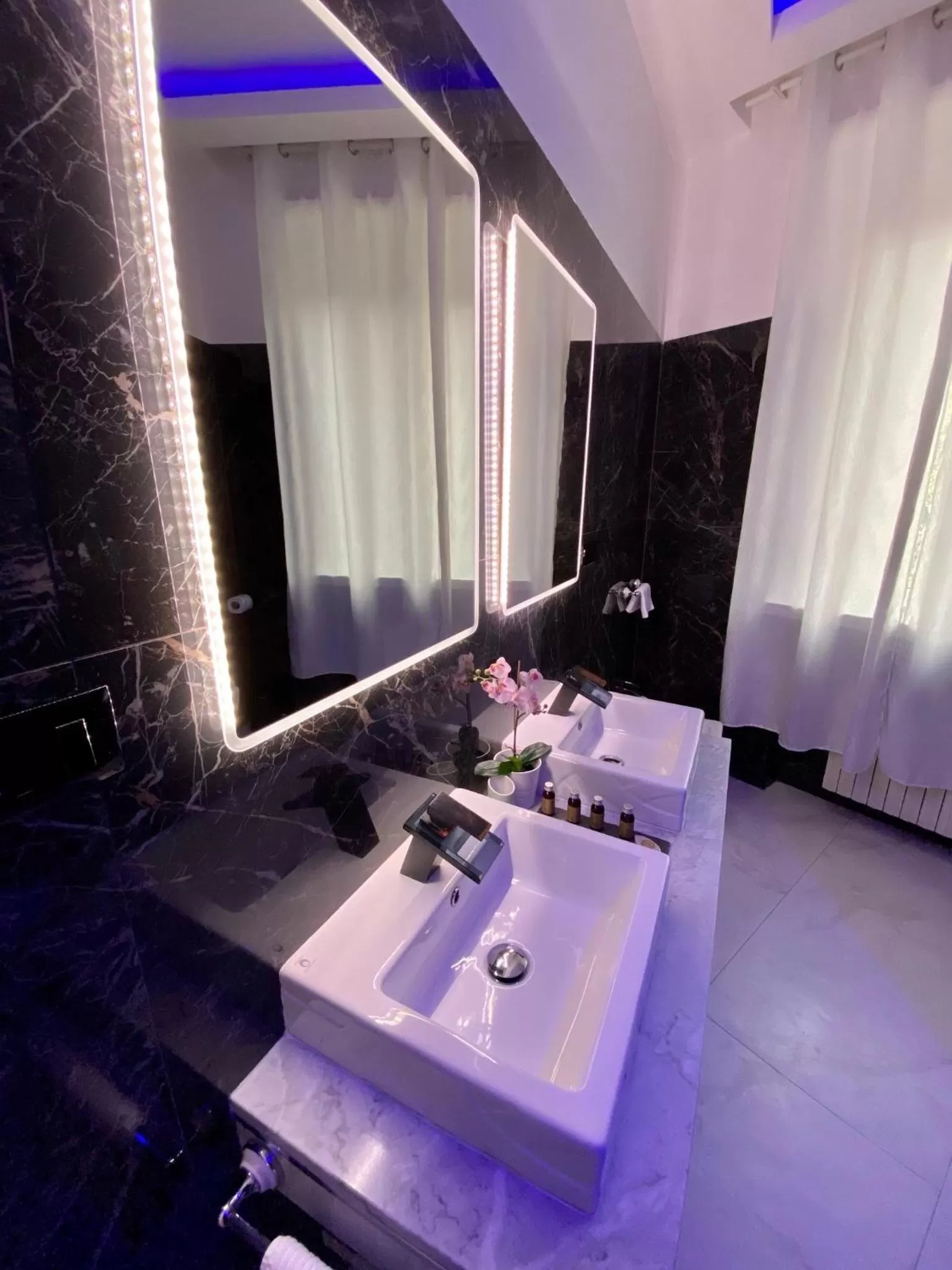 Bathroom in Escape Luxury Suite - CA Domus Collection