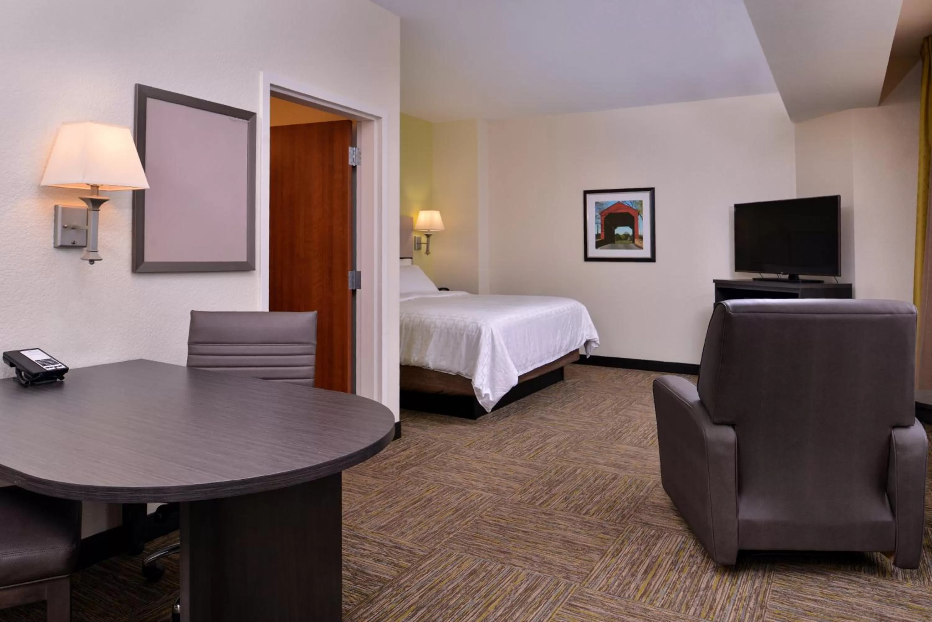Photo of the whole room, Bed in Candlewood Suites Terre Haute by IHG