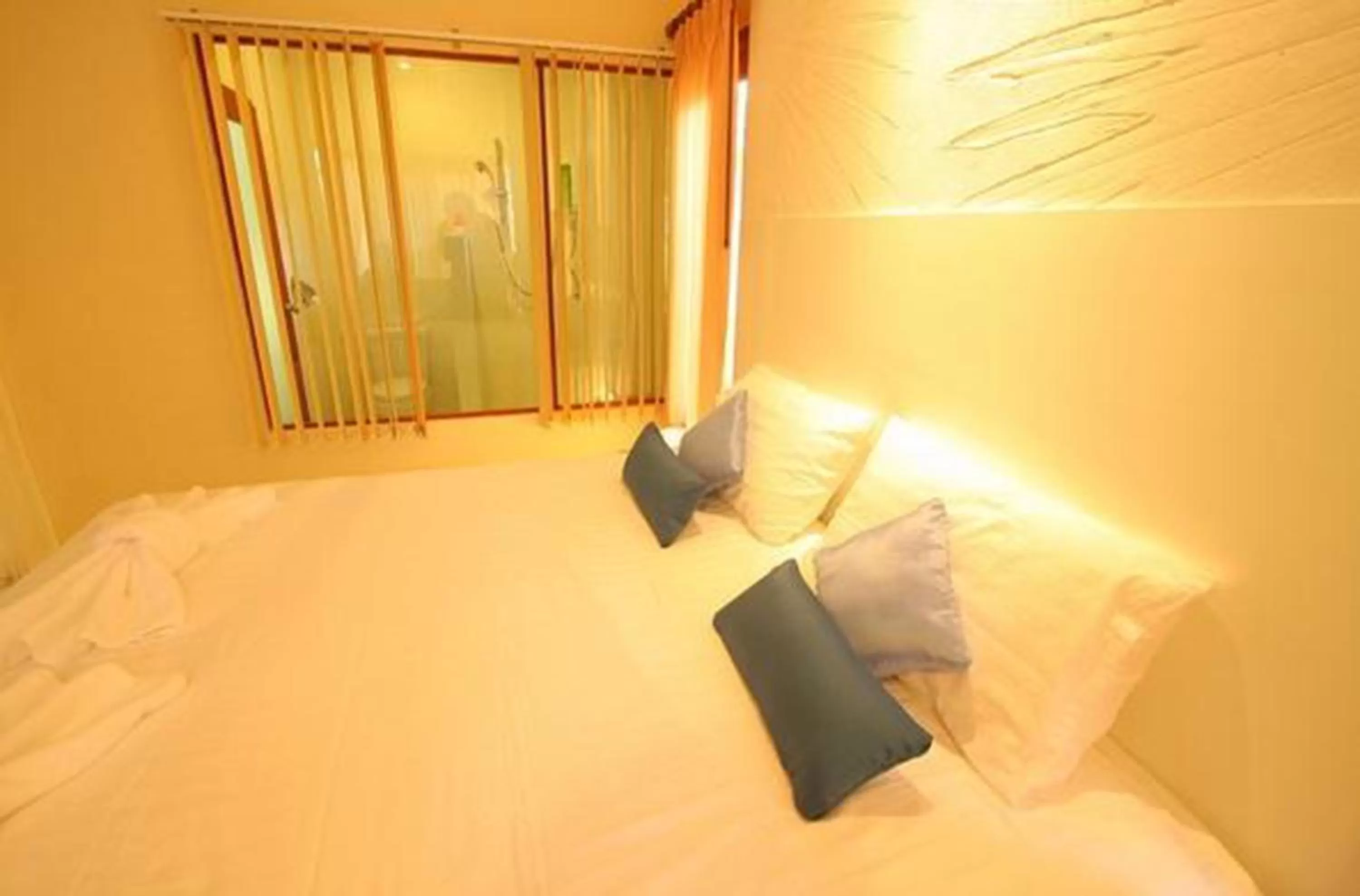 Bed in Panlaan Boutique Resort