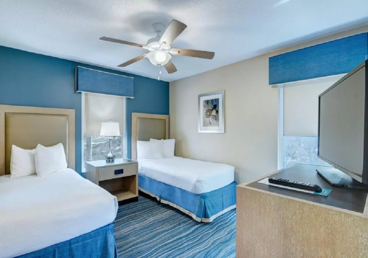 Bedroom, Bed in Summer Bay Orlando by Exploria Resorts