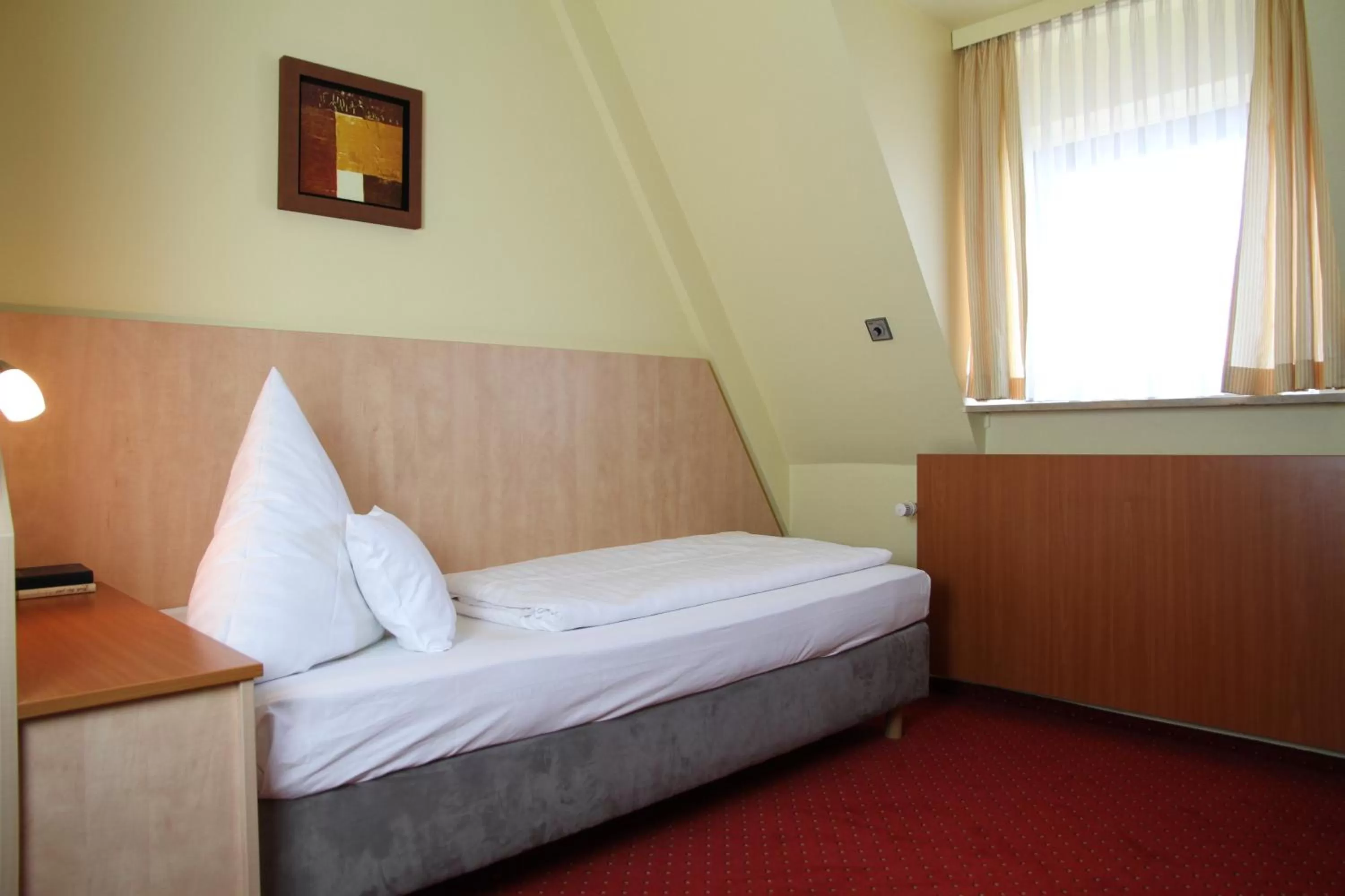 Photo of the whole room, Bed in TOP Hotel Amberger