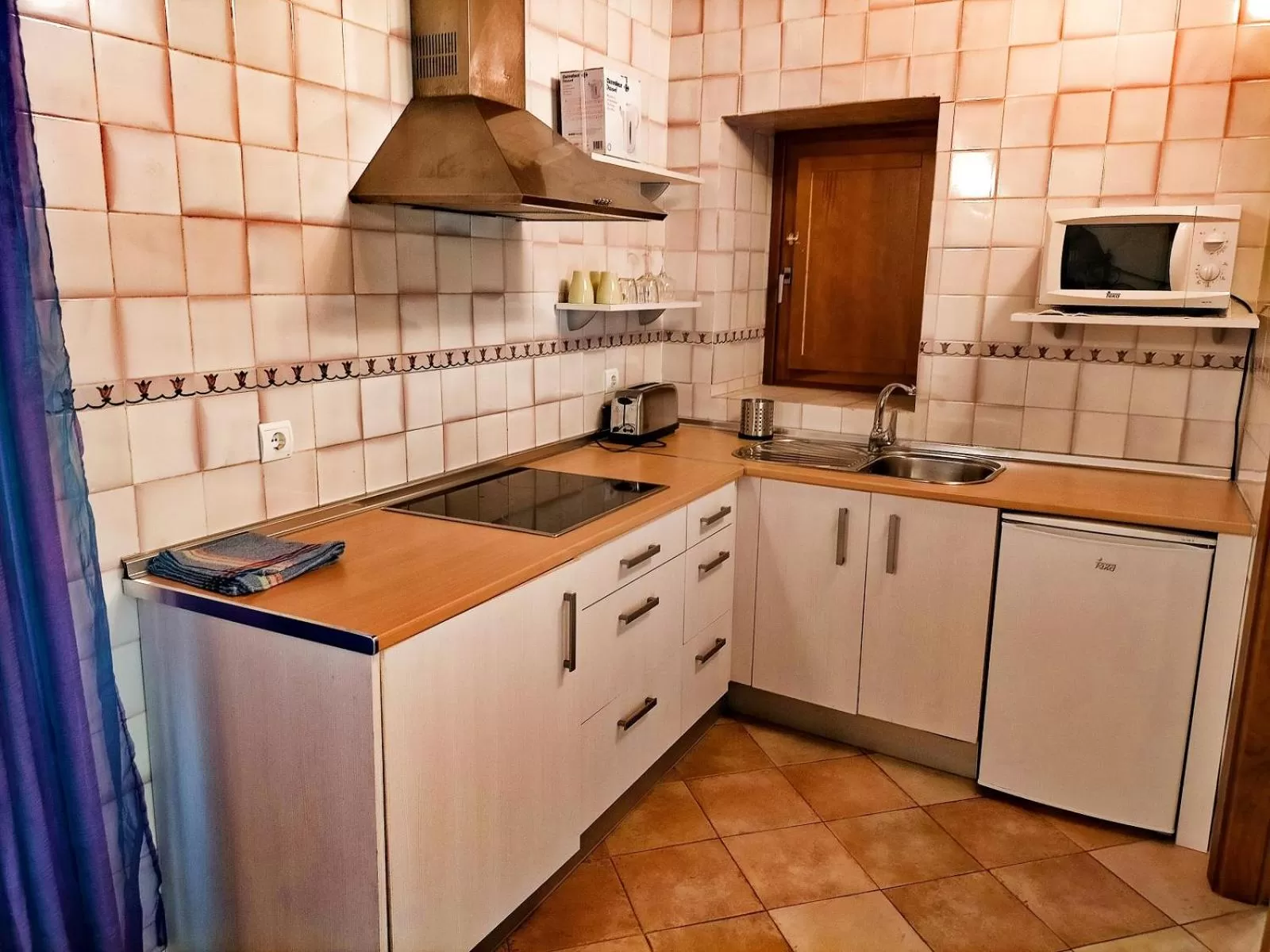 Kitchen or kitchenette in Abadia Suites