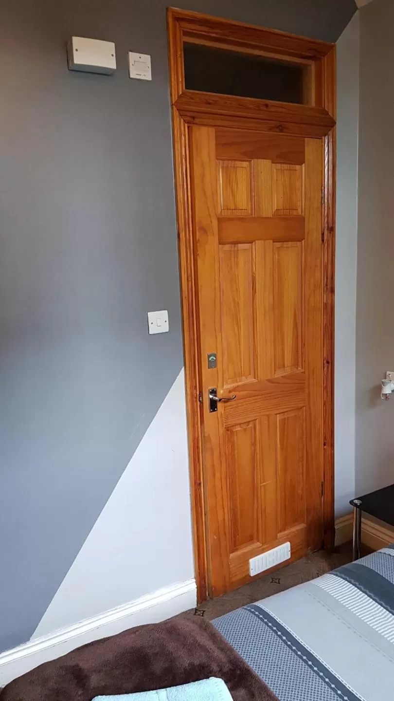 Bedroom in Hour Glass Hotel