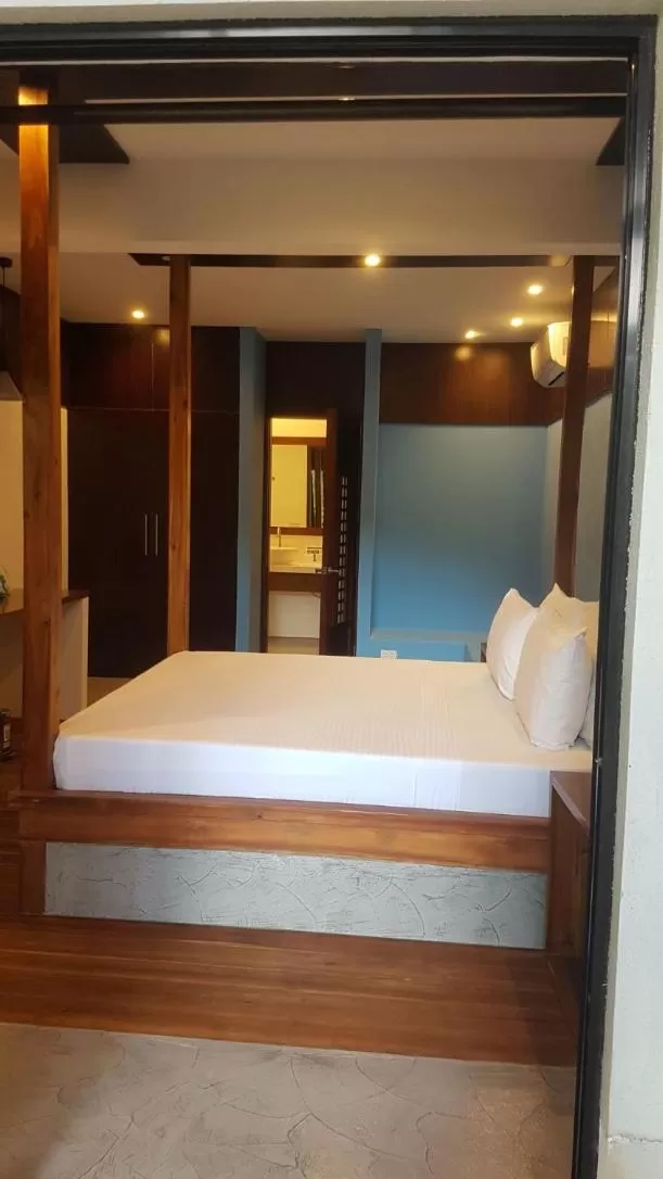 Bed in Mahogany Resort & Spa