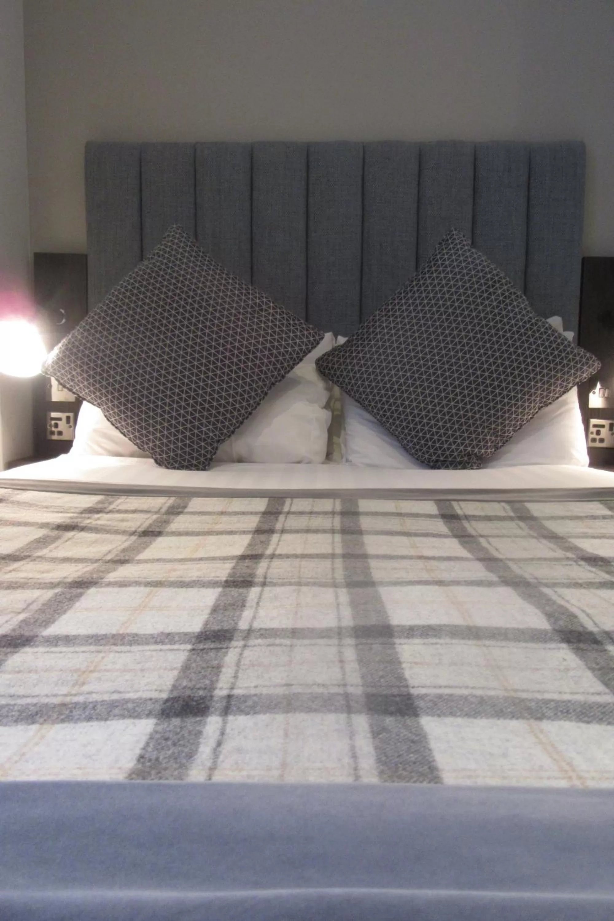 Bed in Garden Court Hotel