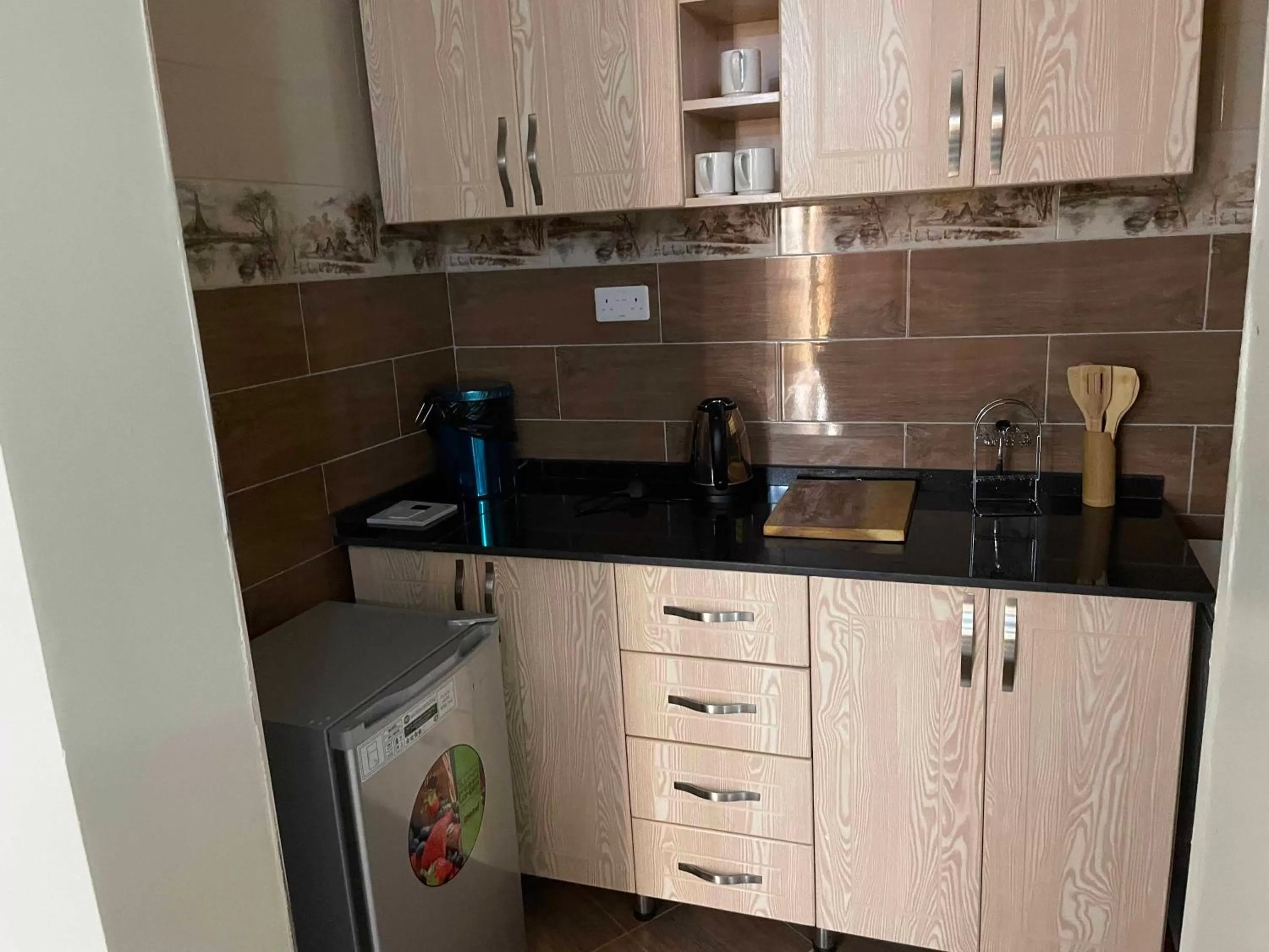 Kitchen or kitchenette in Jaffa Suites