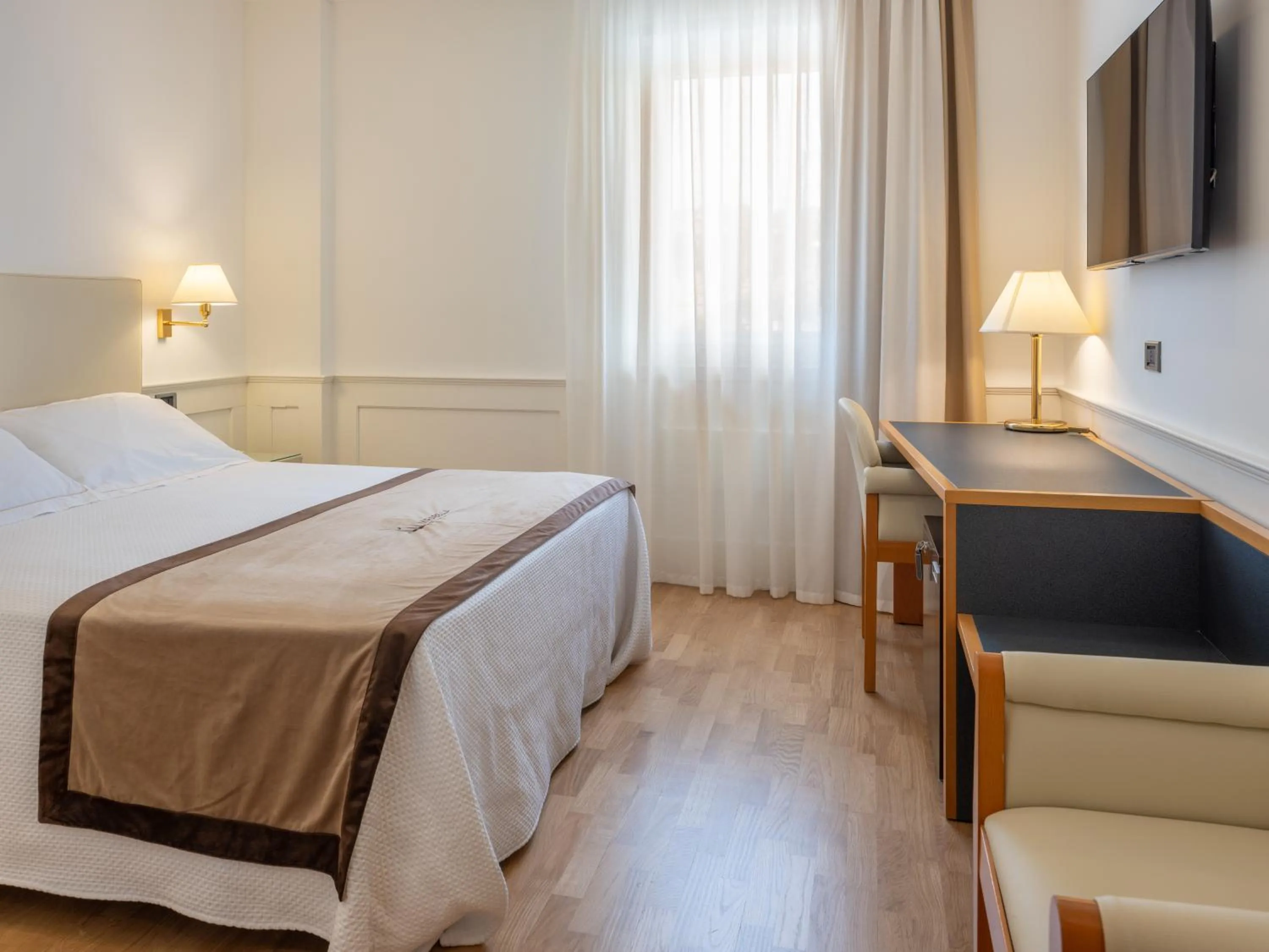 Photo of the whole room, Bed in Mirabella Hotel