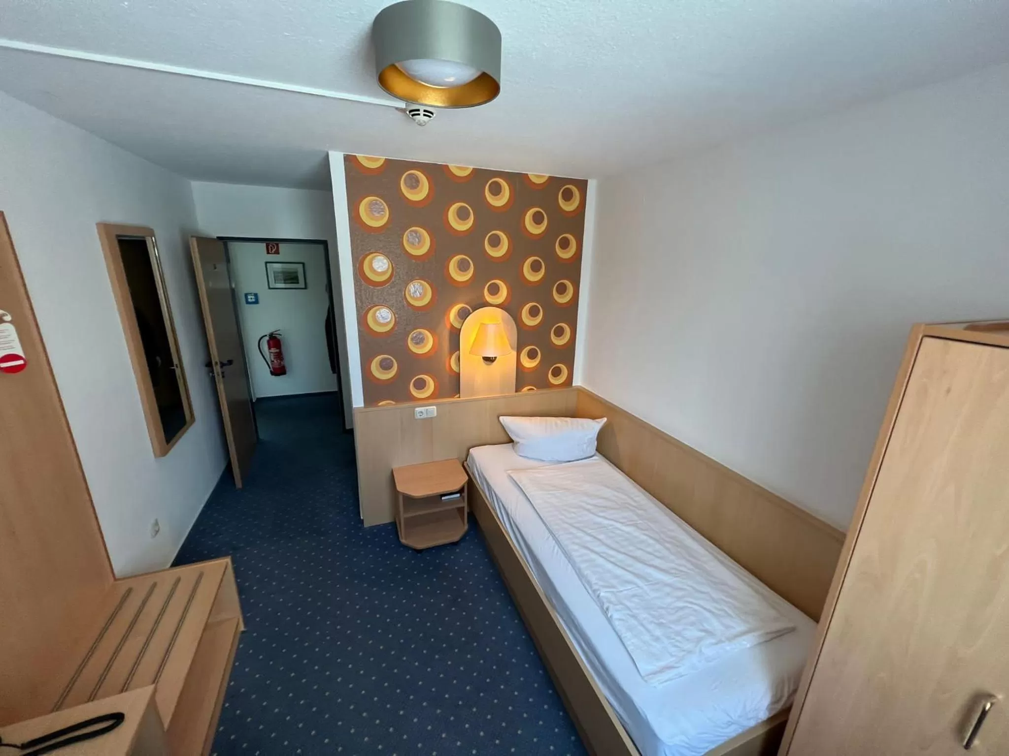 Bed in Zeitwohnen Wolfsburg, ehemals Hotel am Klieversberg ein Unternehmen der Micha'S Hotelbetriebe