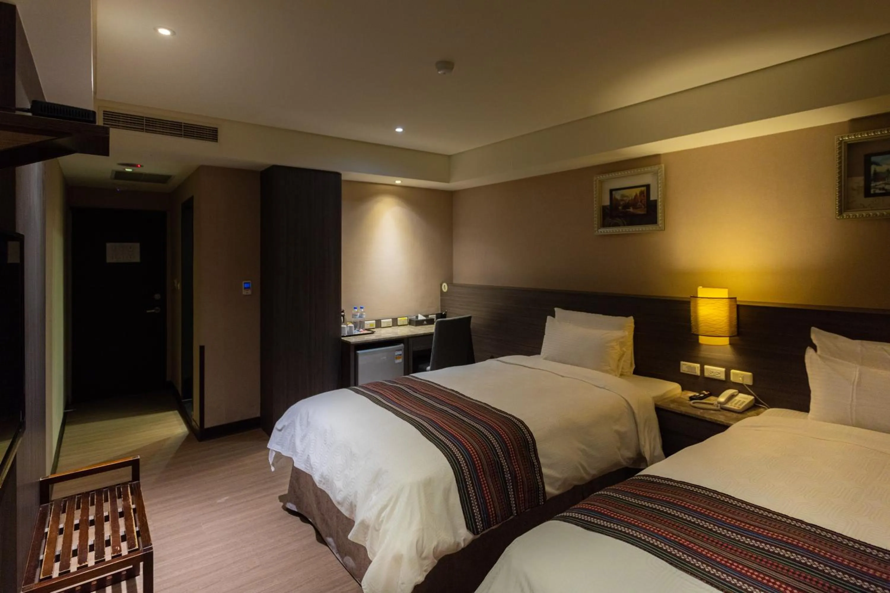 Bed in Royal Guest Hotel