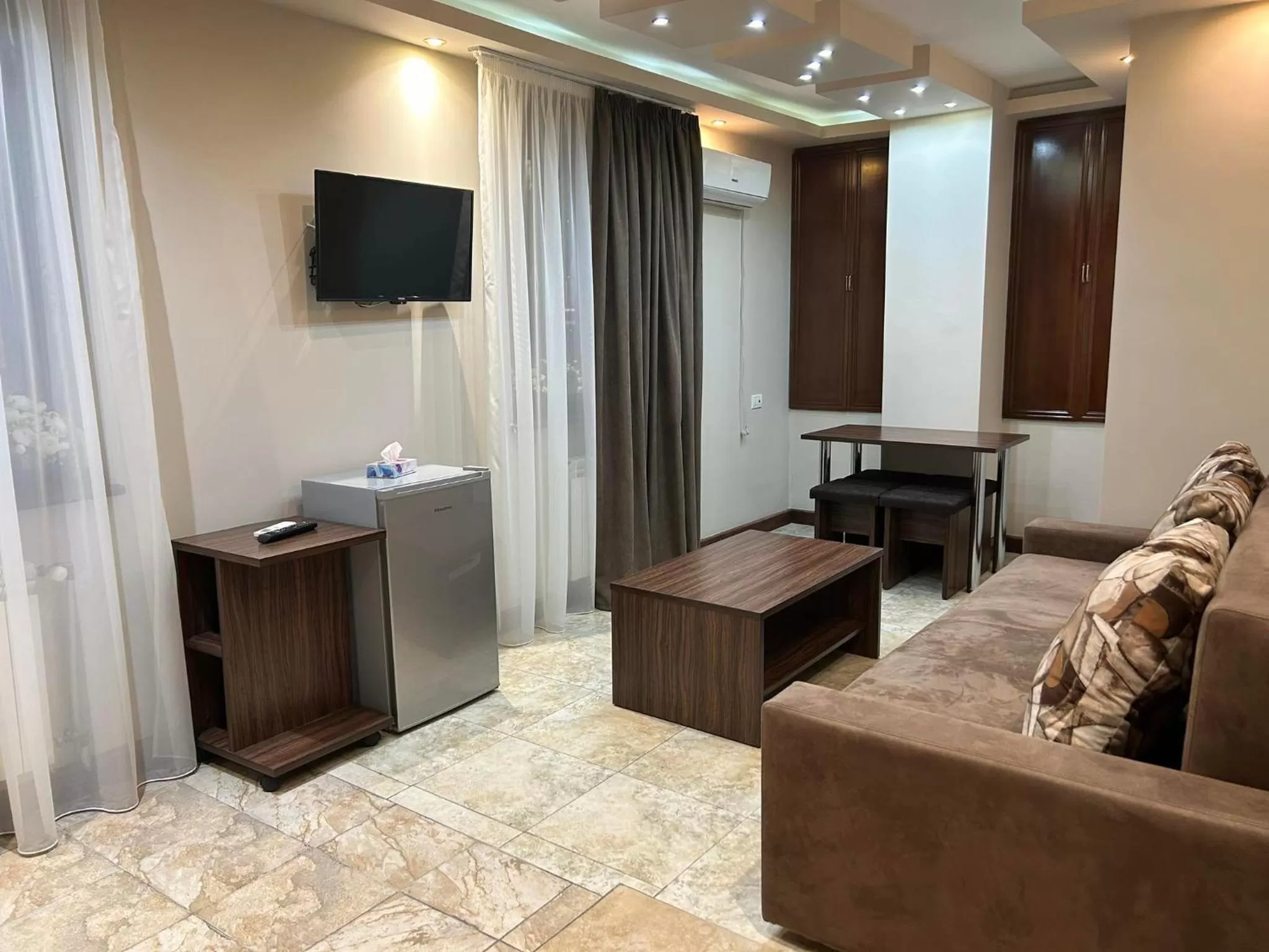 TV and multimedia, TV/Entertainment Center in Time Hotel & Tours