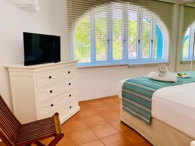 Bed in BeachView Apartments at Villa Paradiso
