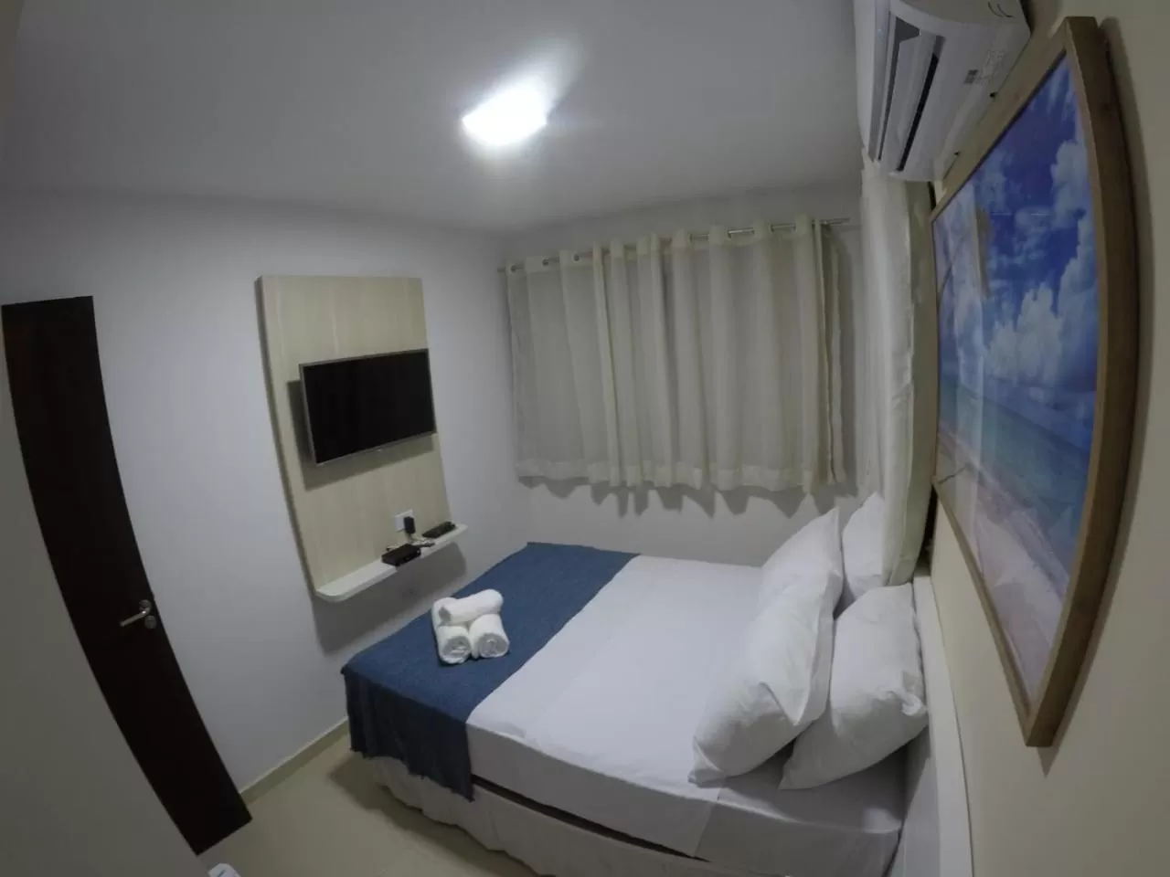 Bed in Pousada Kanoas