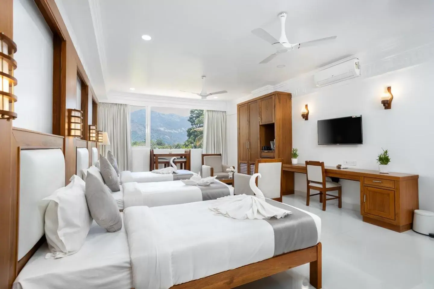 Luxury Triple Room in HOTEL WHITE HOUSE, Munnar Luxury Triple Room in HOTEL WHITE HOUSE, Munnar