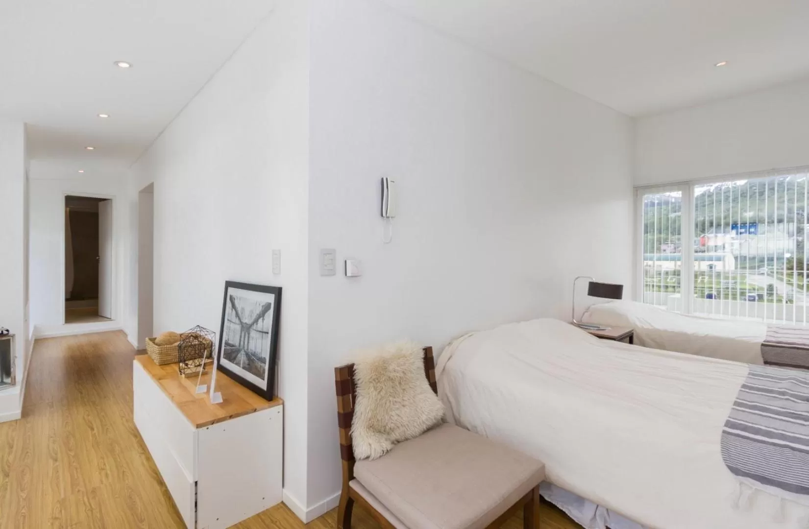 Bed in De la Costa Apartamentos