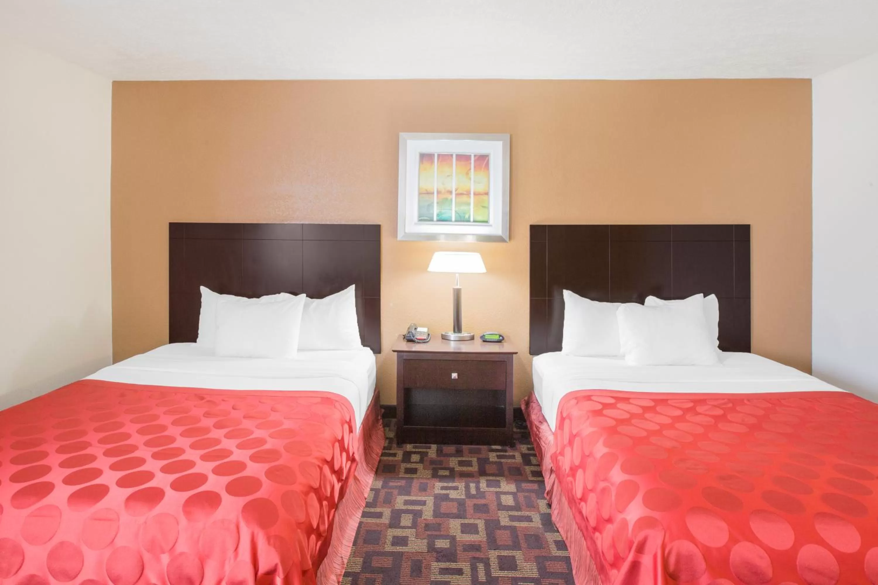 Bed in Ramada by Wyndham Tulsa
