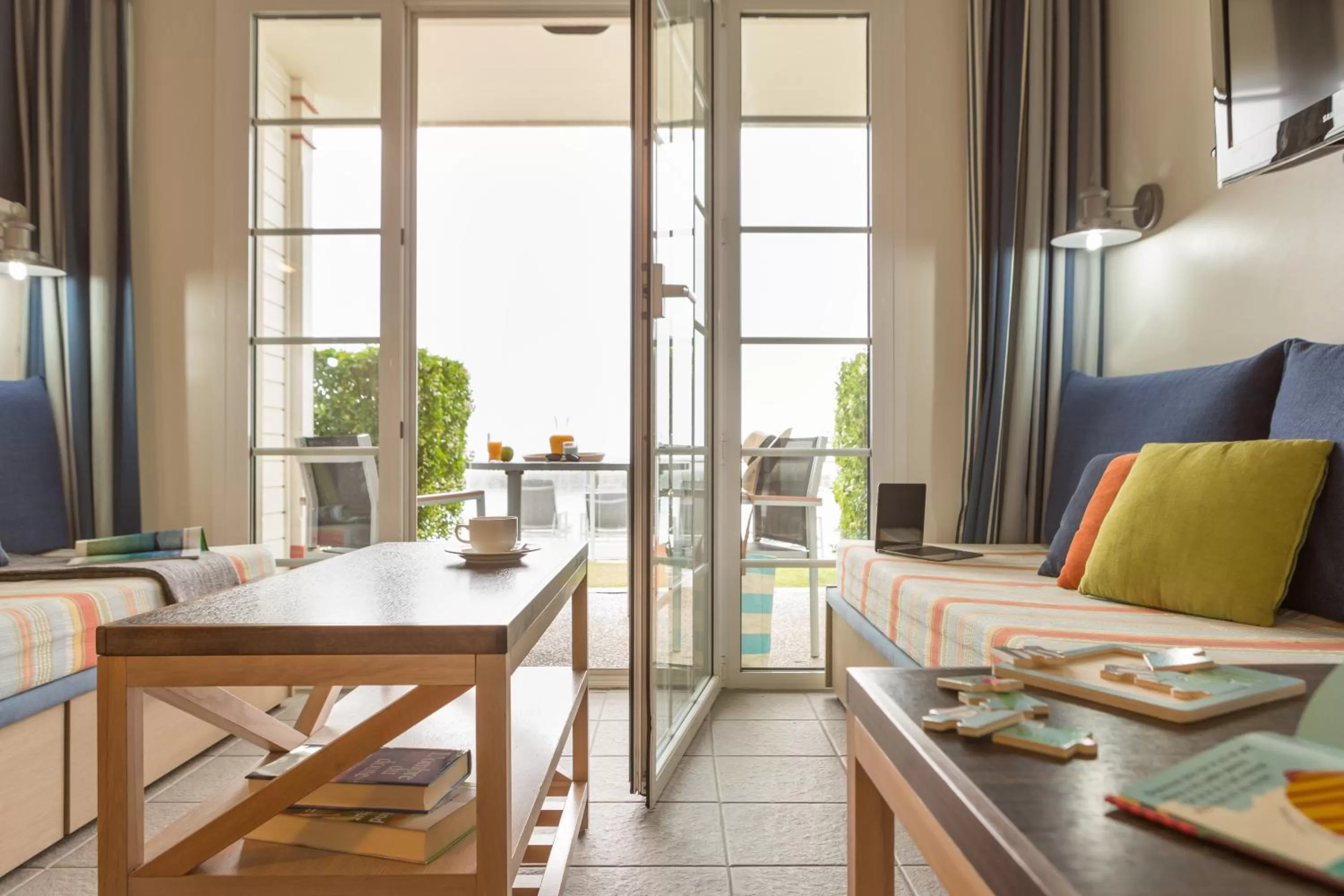 Communal lounge/ TV room in Pierre & Vacances Premium Résidence de la Plage