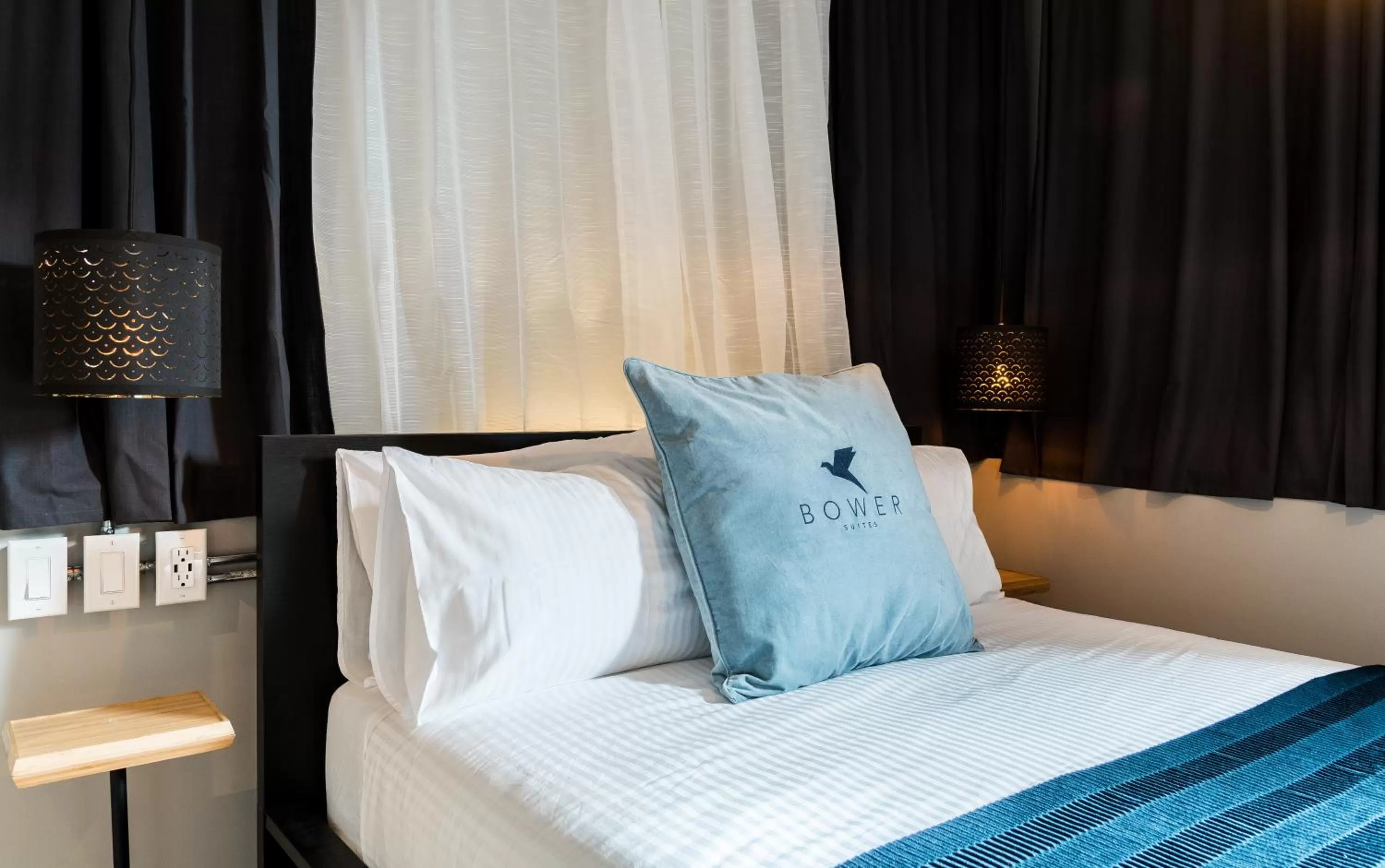 Bed in Capitol Robinson by Bower Hotels & Suites