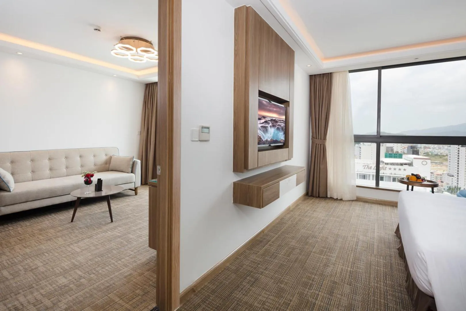 TV and multimedia, Bed in Comodo Nha Trang Hotel