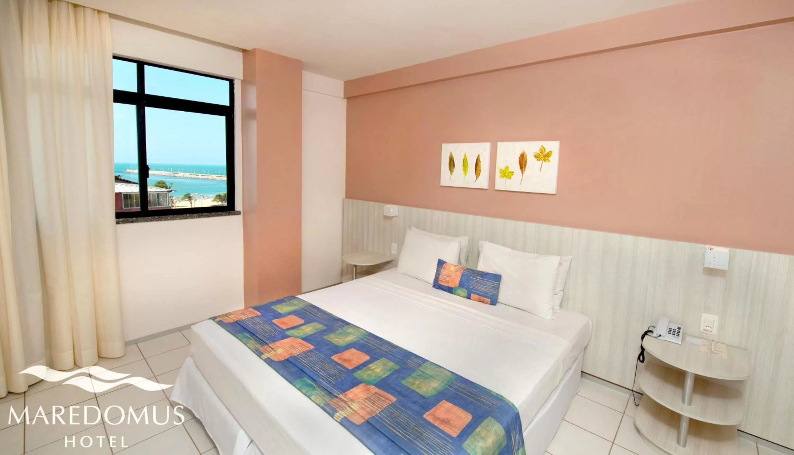 Bed in Maredomus Hotel