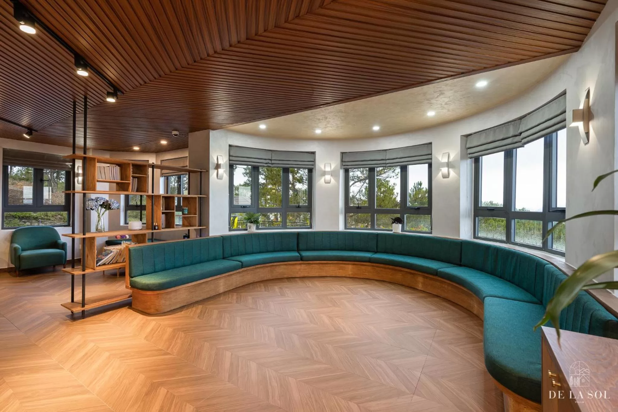 Communal lounge/ TV room in De La Sol Villa Dalat