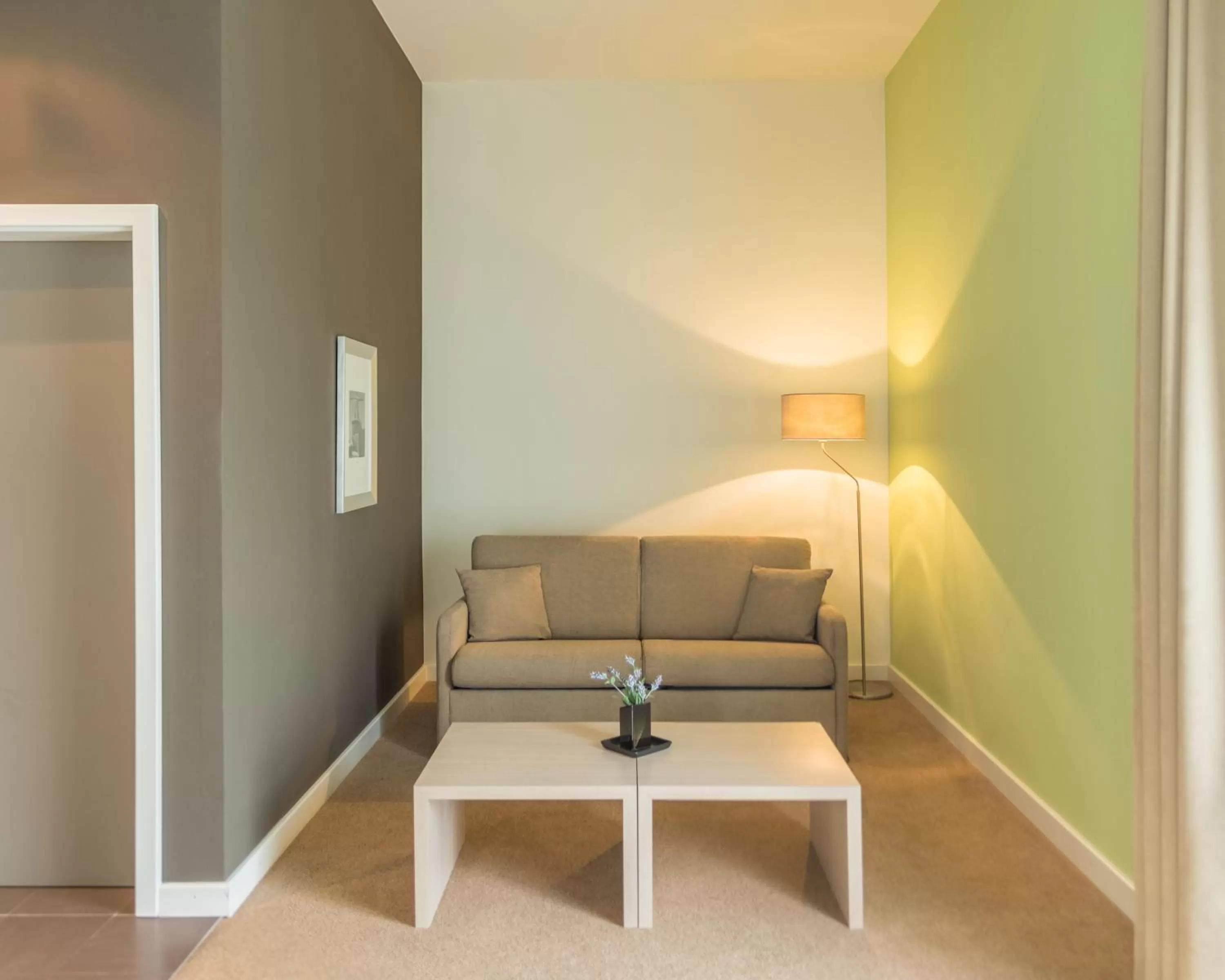 Living room in Ramada by Wyndham München Airport