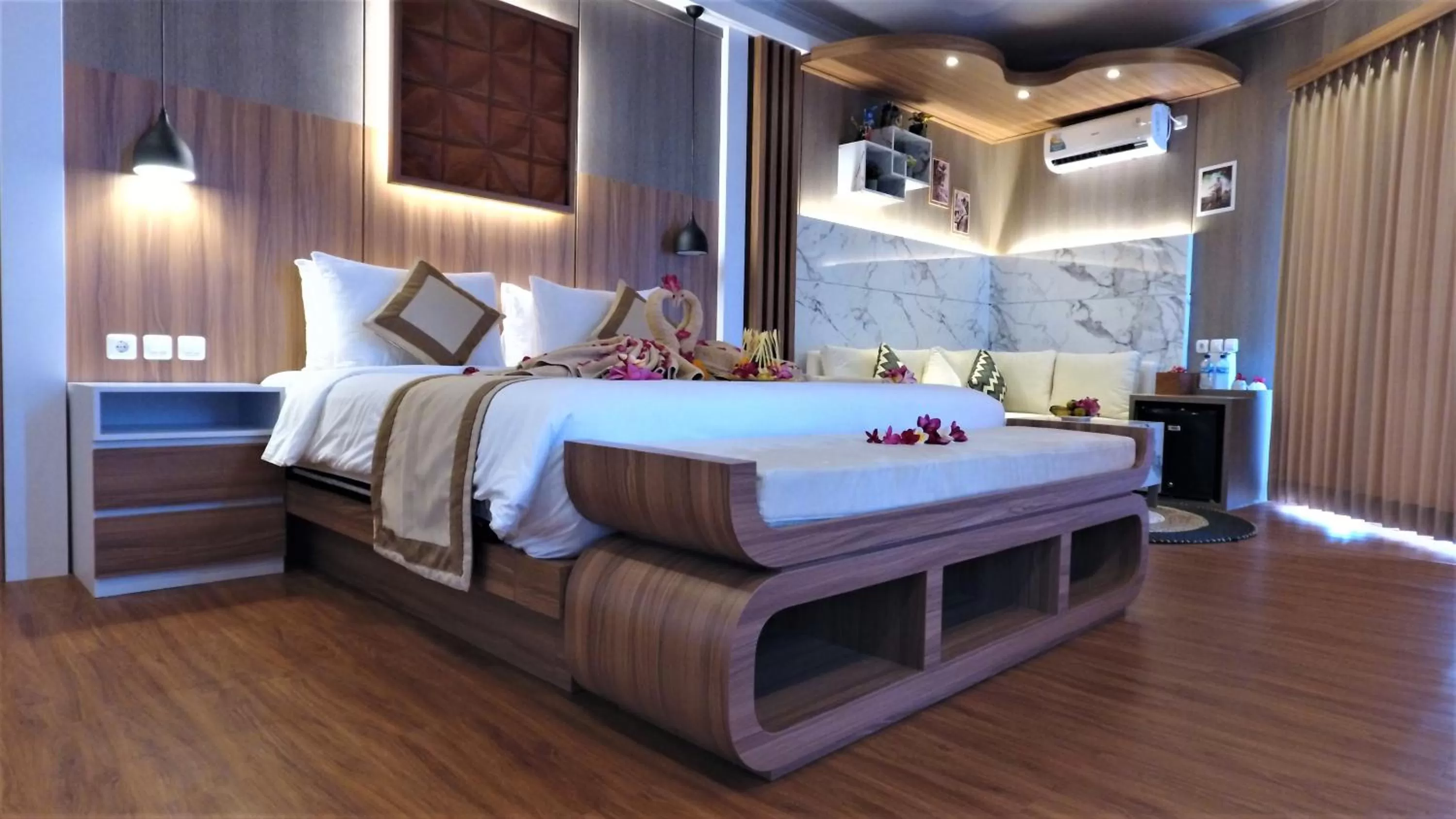 Bed in SUITE OCEAN BLUE