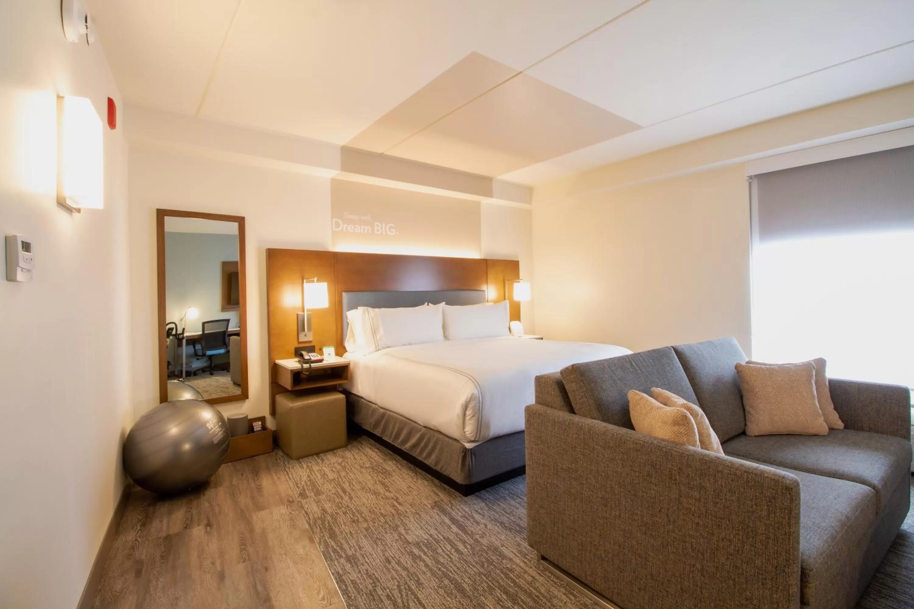 Seating area in EVEN Hotel Manchester Airport by IHG