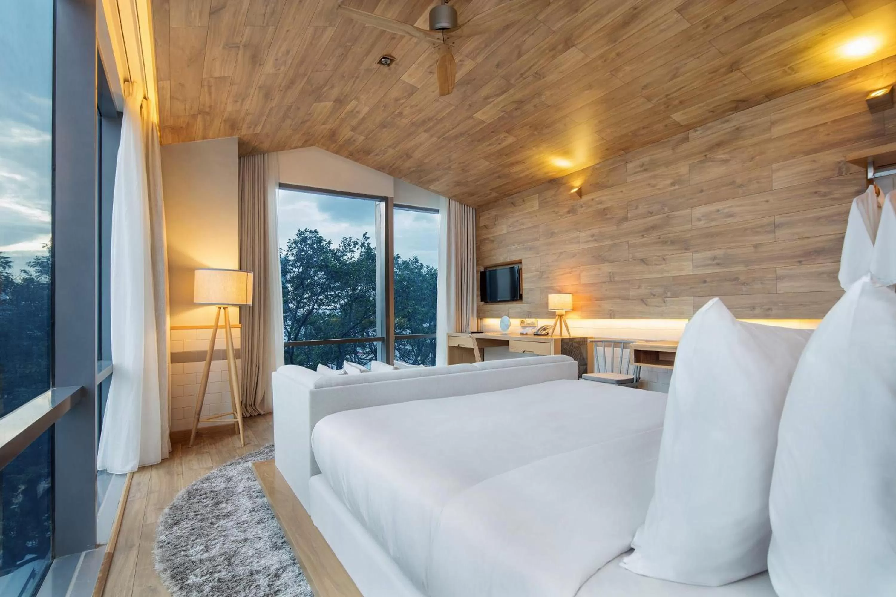 Photo of the whole room, Bed in Fusion Suites Saigon