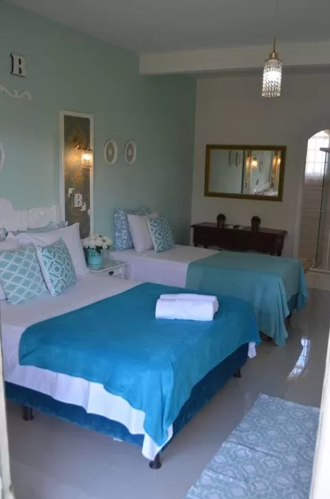 Bed in La Maison Brasiliana B&B