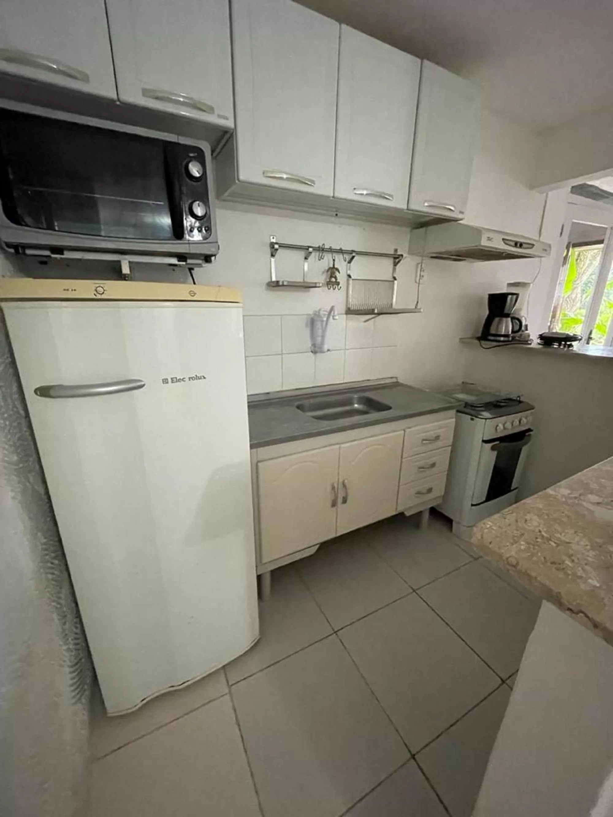 Kitchen or kitchenette in Pousada Saint Germain