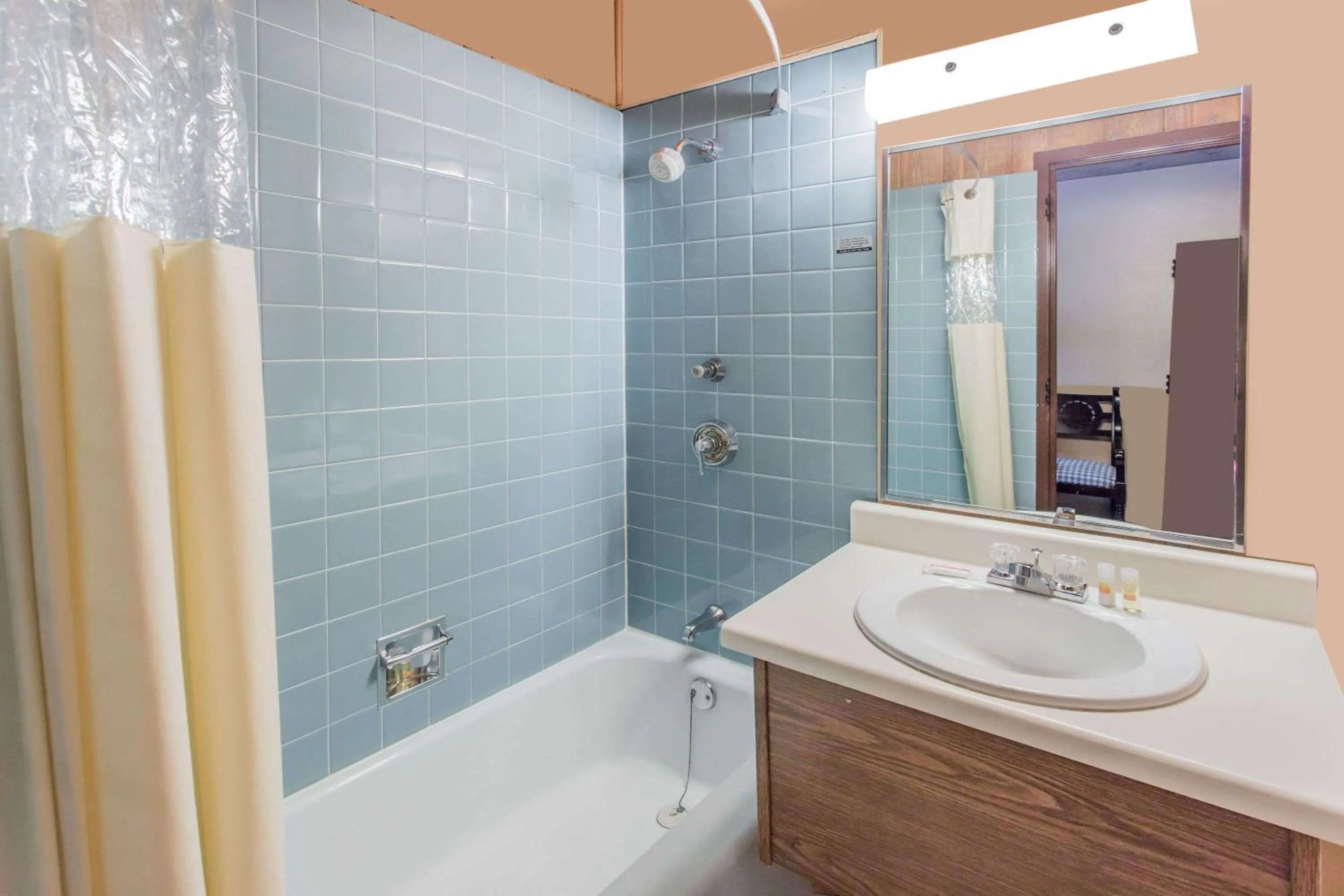 Bathroom in Days Inn by Wyndham West Allis/Milwaukee