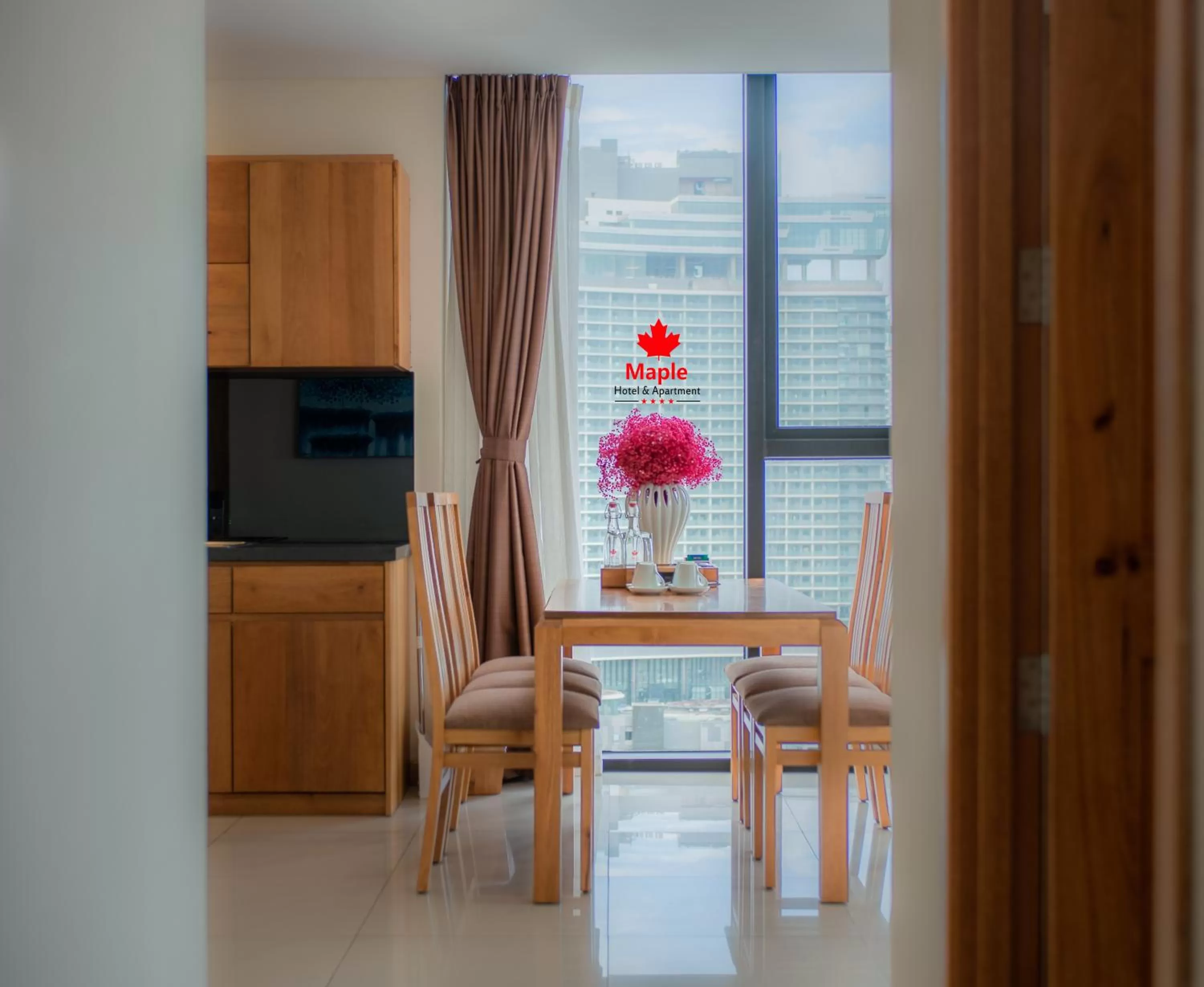 Dining area in Maple Hotel & Apartment