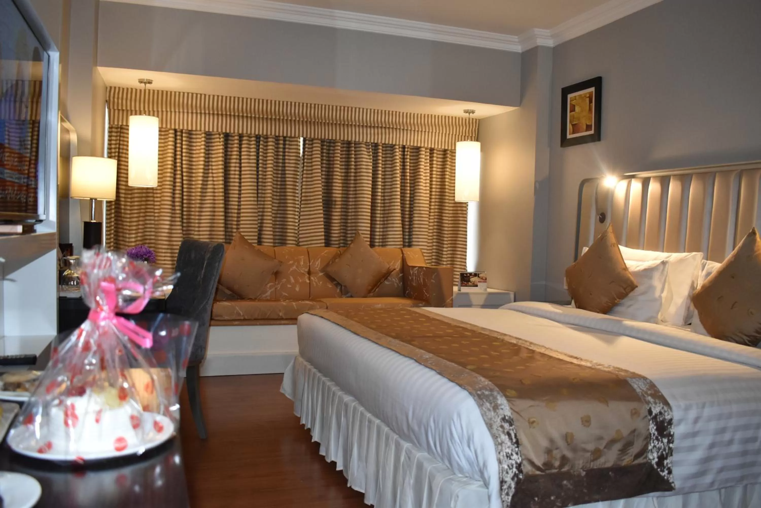 Bed in Ramada Plaza by Wyndham Karachi Airport Hotel