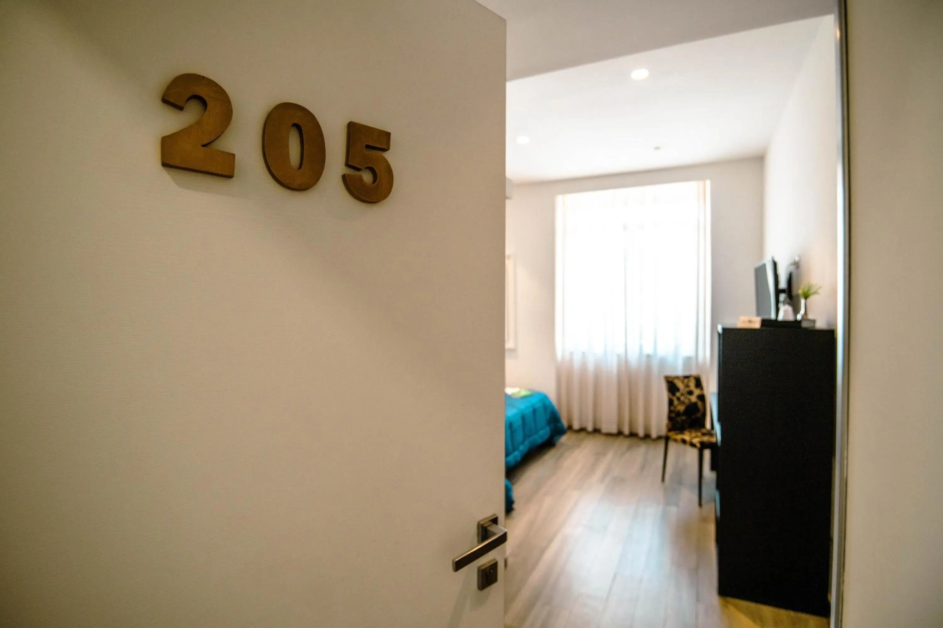 Photo of the whole room in Hotel Bruman Salerno