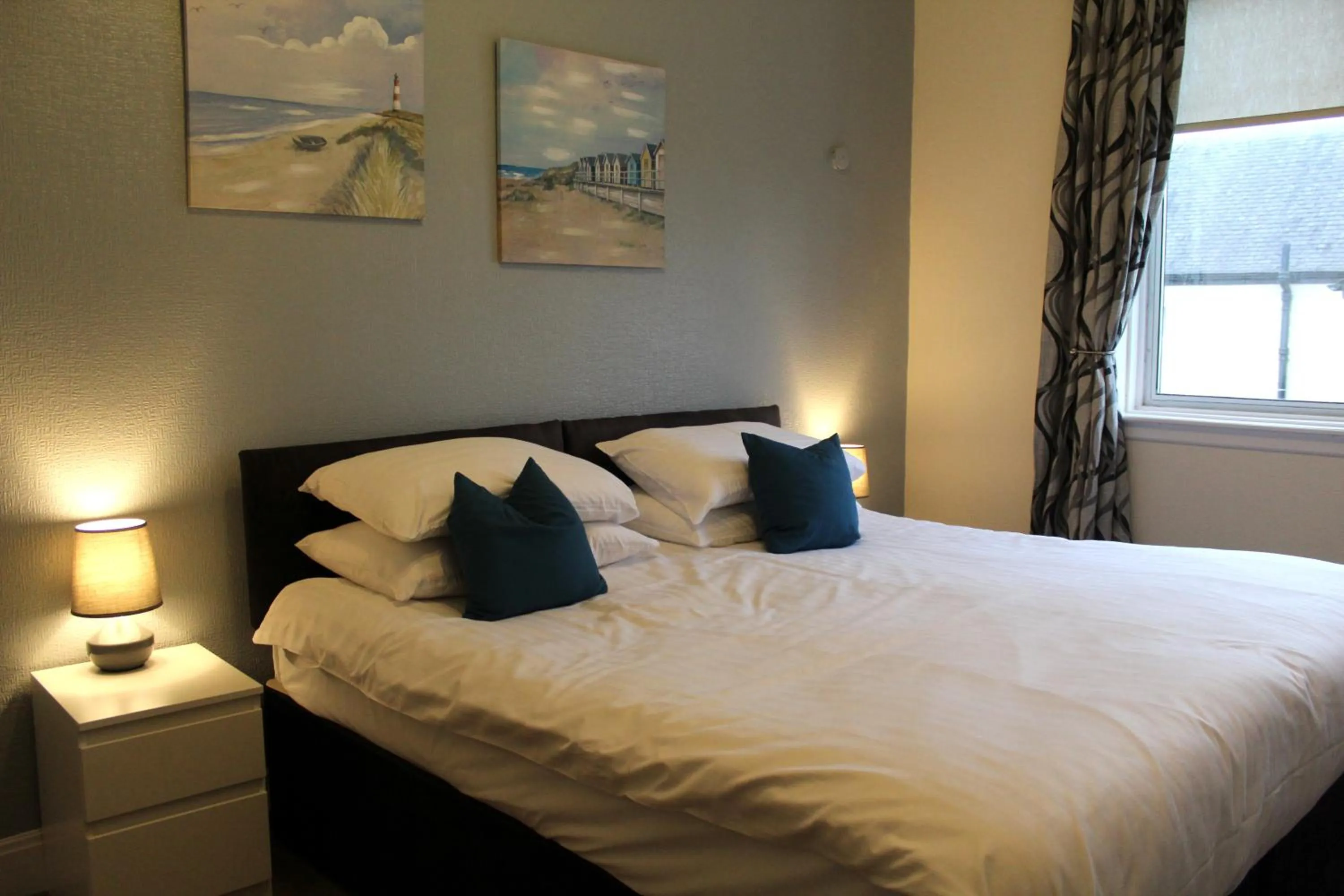 Bed in The Woodhouse Hotel