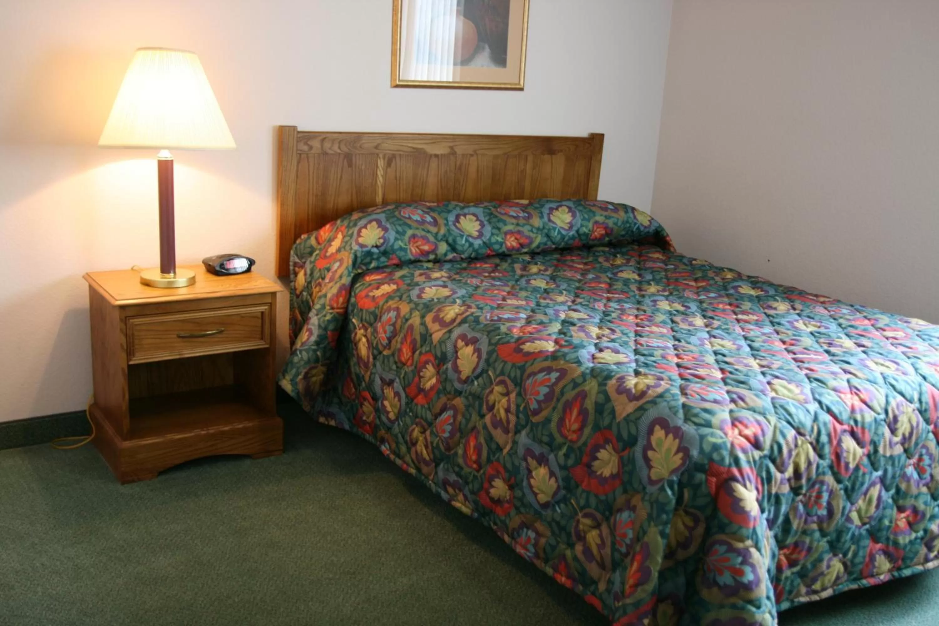 Bed in Affordable Suites Rocky Mount