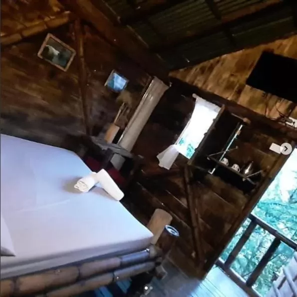 Bedroom in Cabañas Rústicas El Viejo Tambo By Rotamundos