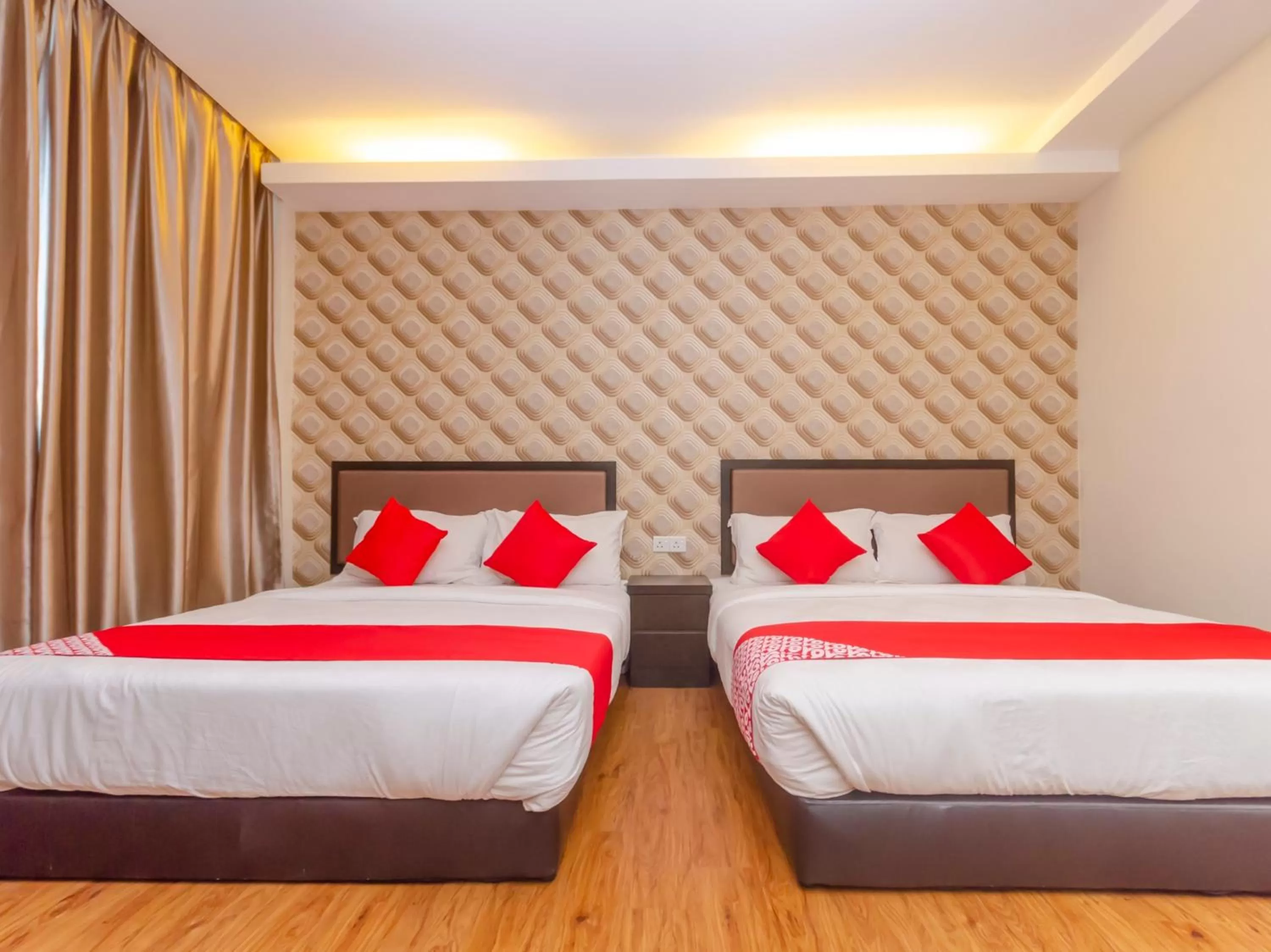 Bedroom in OYO 1214 Oro Hotel