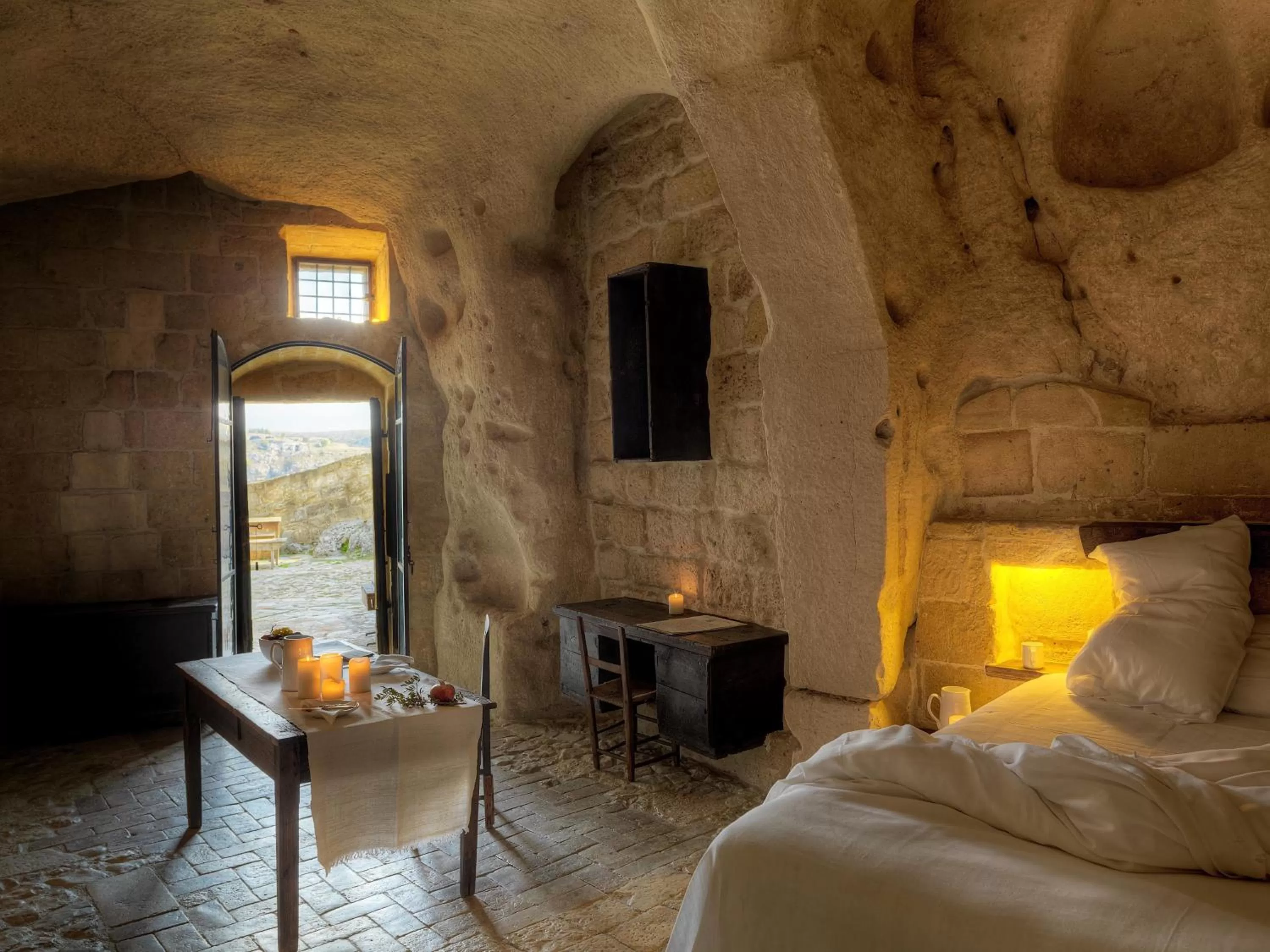 Photo of the whole room, Bed in Sextantio Le Grotte Della Civita