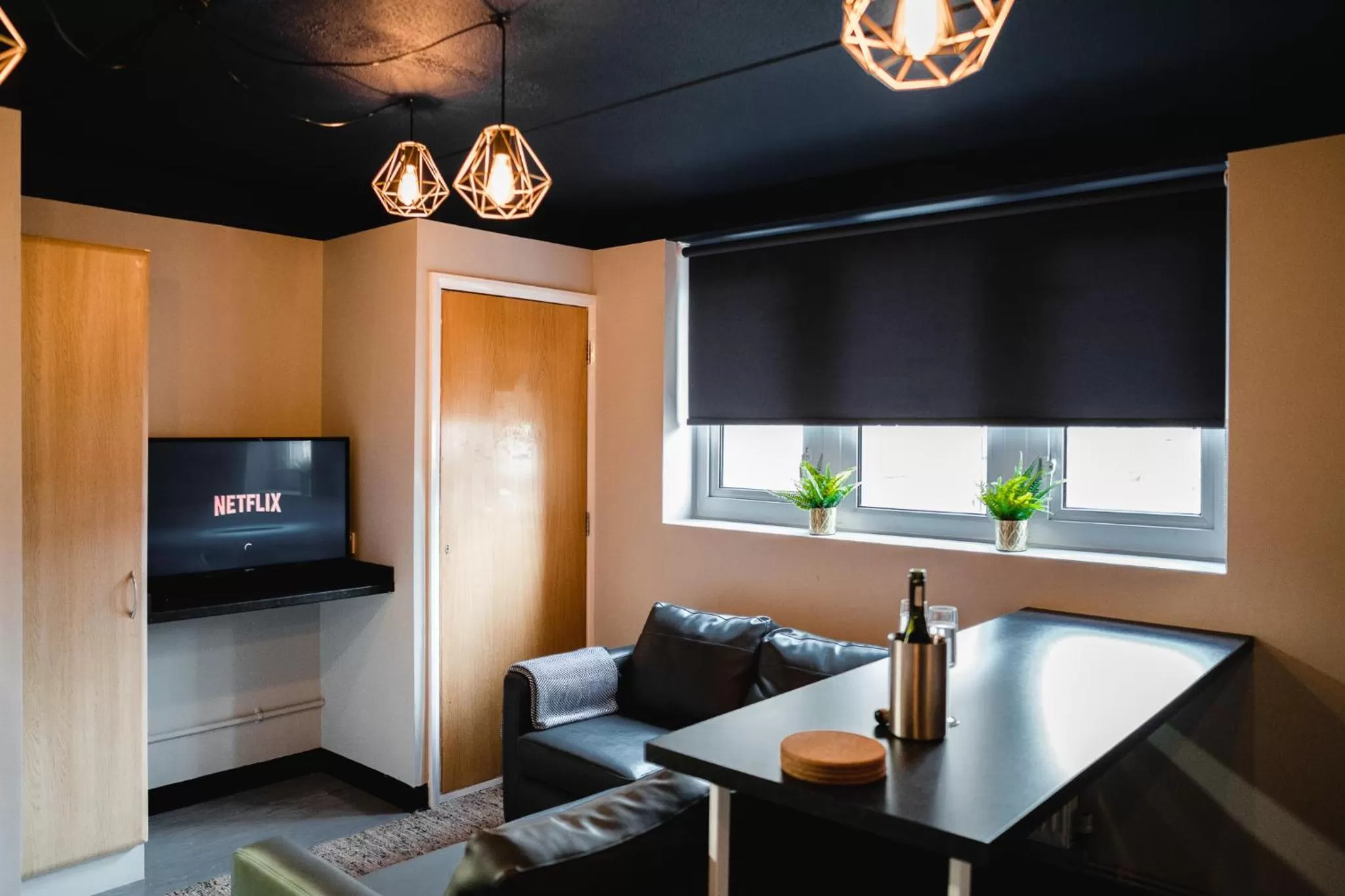 Communal lounge/ TV room in The Venue Serviced Apartments