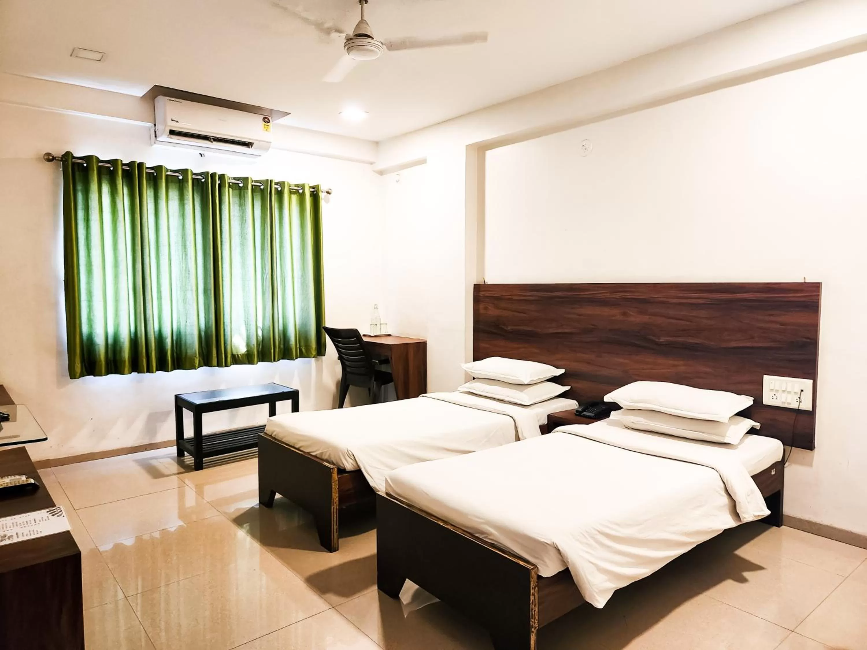 Bed in Hotel Rajwada Aurangabad