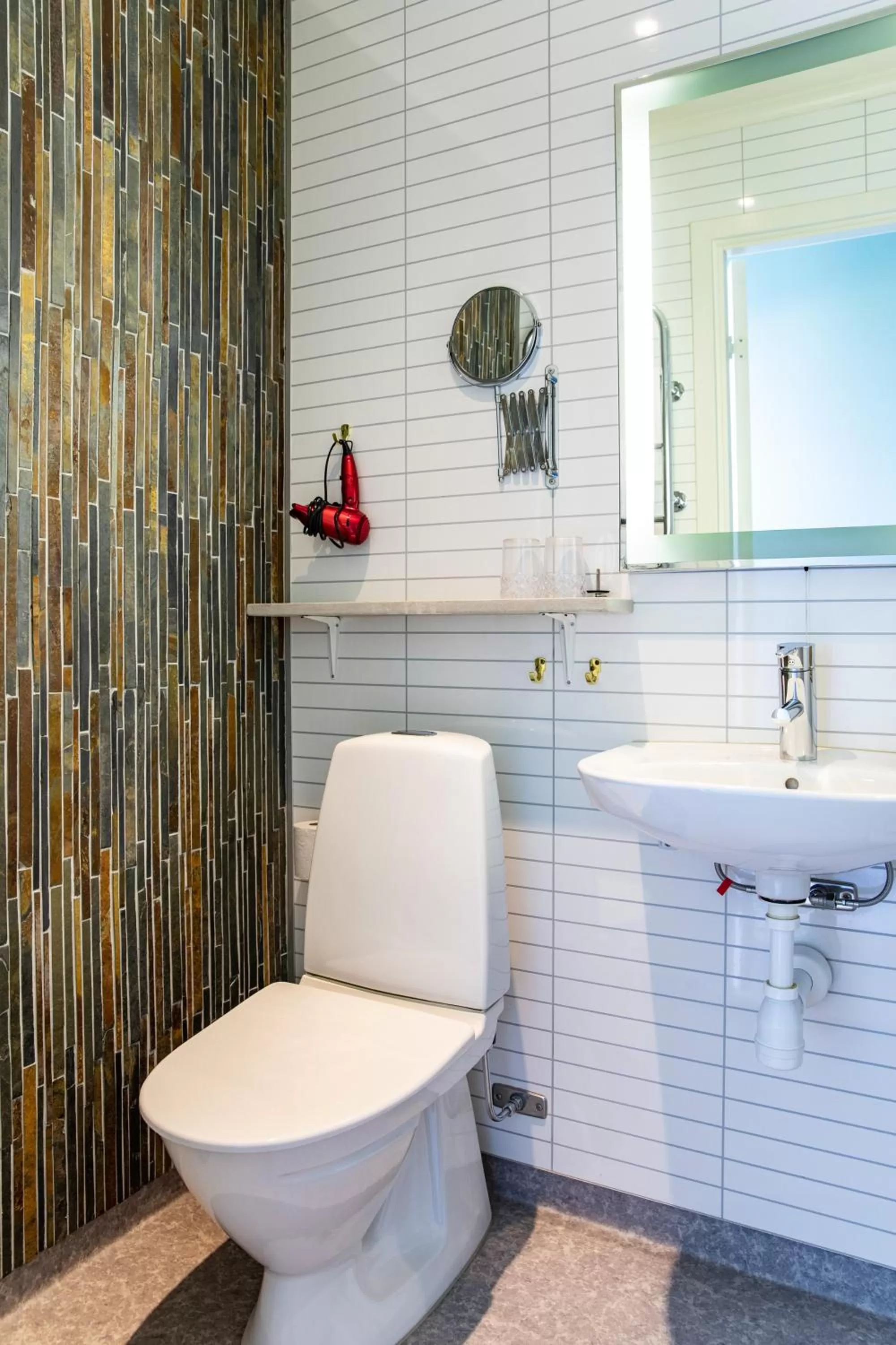 Toilet in Hotell Breda Blick