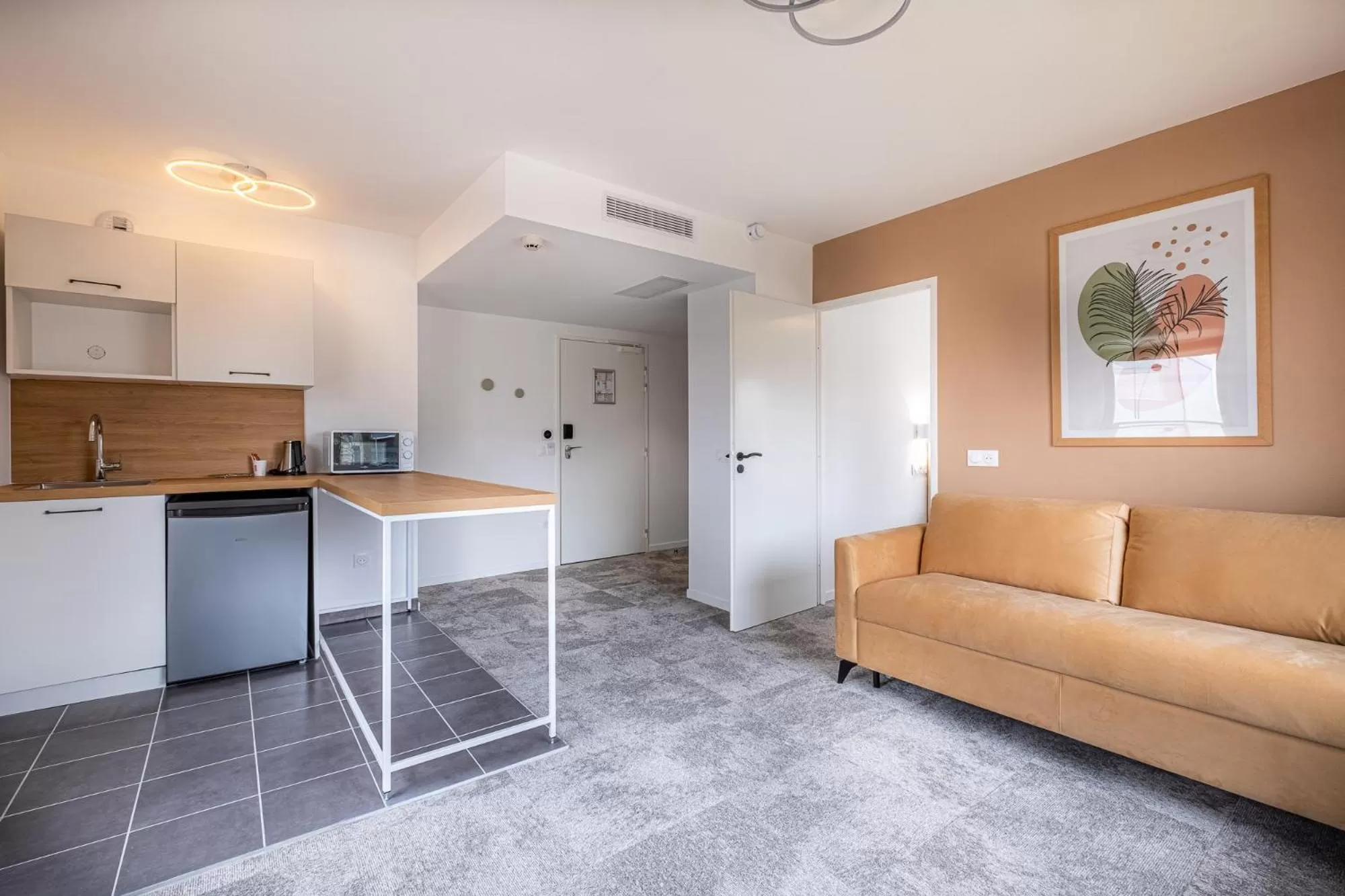 Kitchen or kitchenette in The Originals Boutique Hôtel Amiens Sud