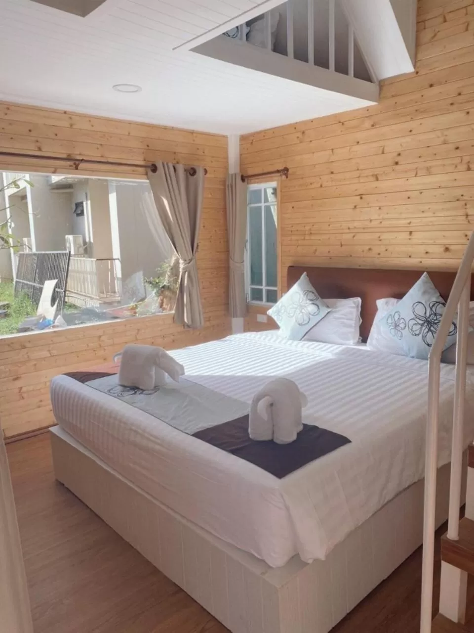 Bed in Panlaan Boutique Resort